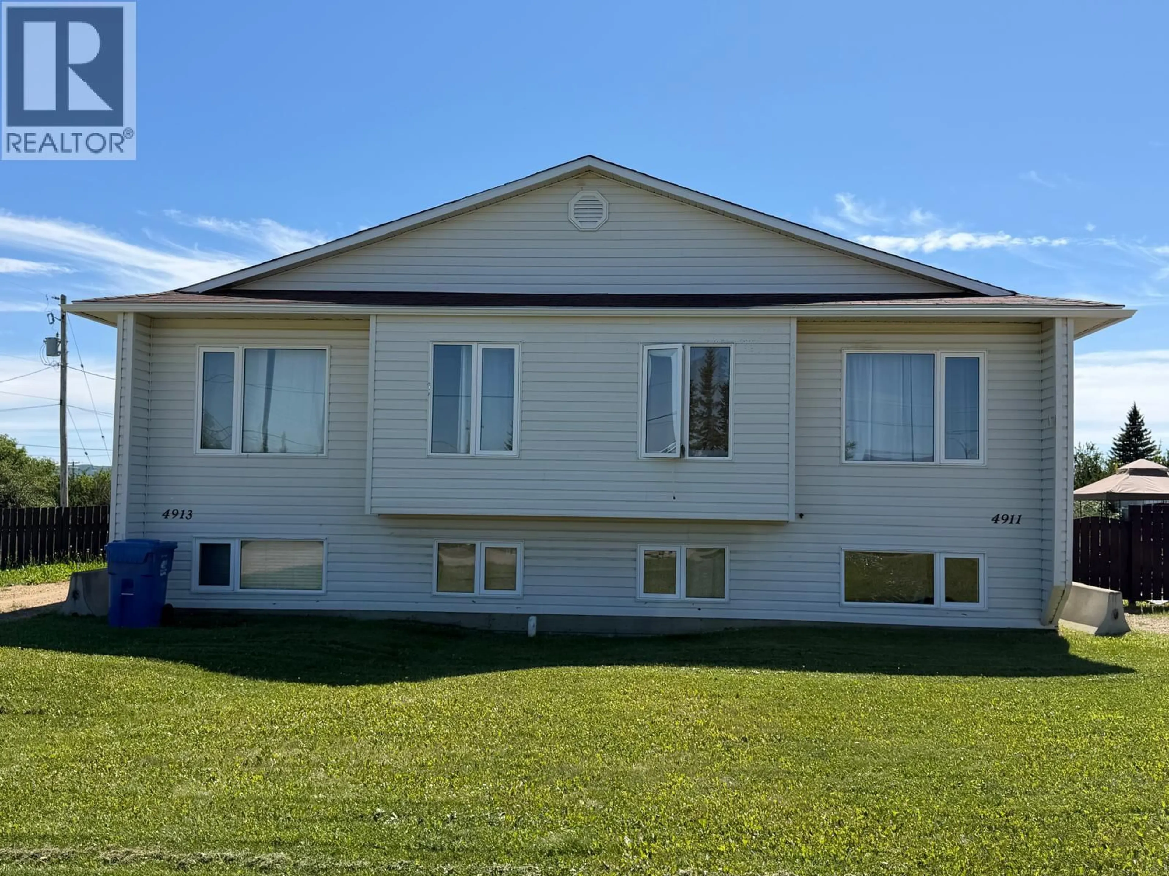 Home with vinyl exterior material, building for 4911/4913 56 AVENUE, Pouce Coupe British Columbia V0C2C0