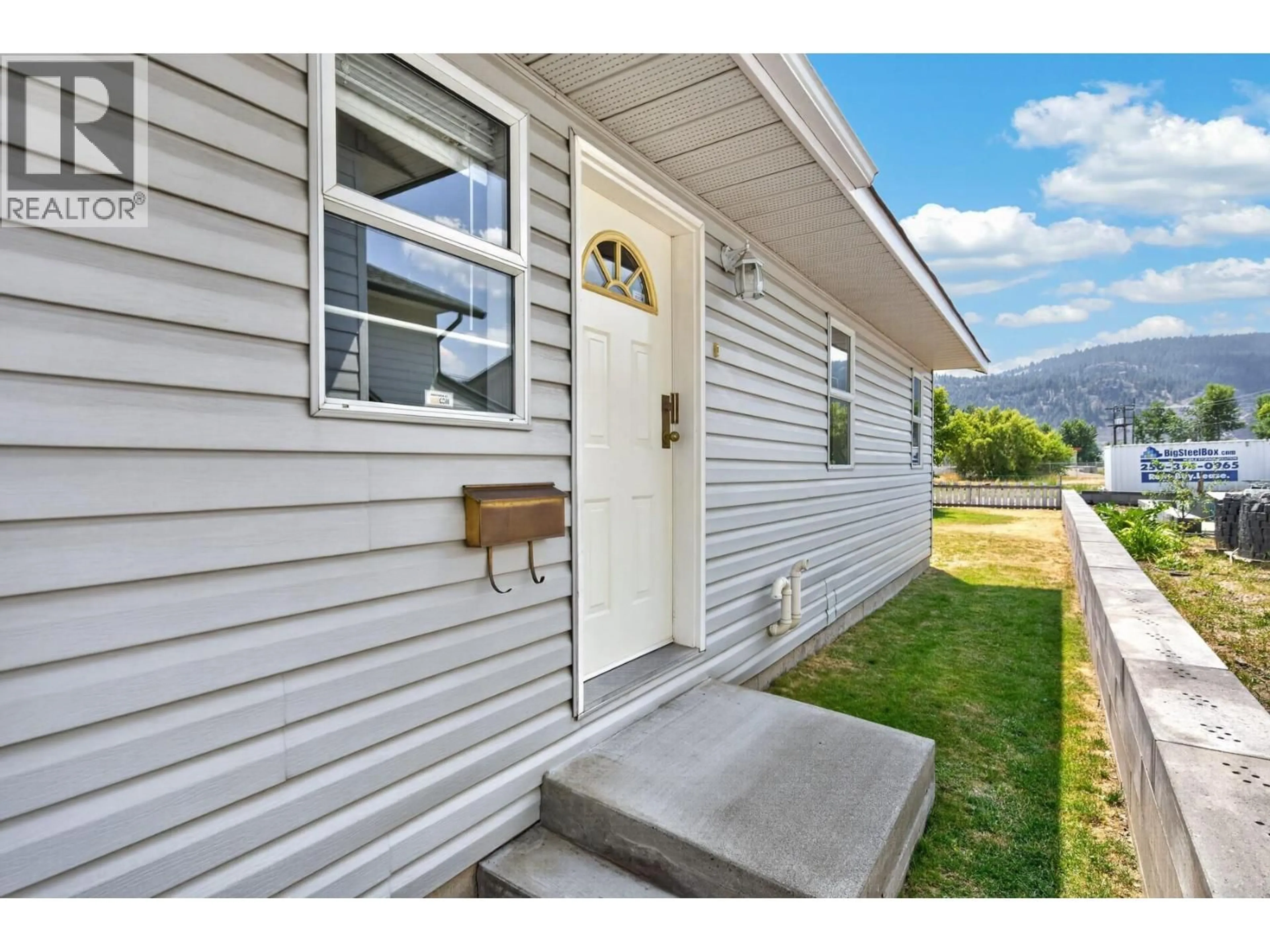 Home with vinyl exterior material, mountain view for 1540 CANFORD AVENUE, Merritt British Columbia V1K1B8