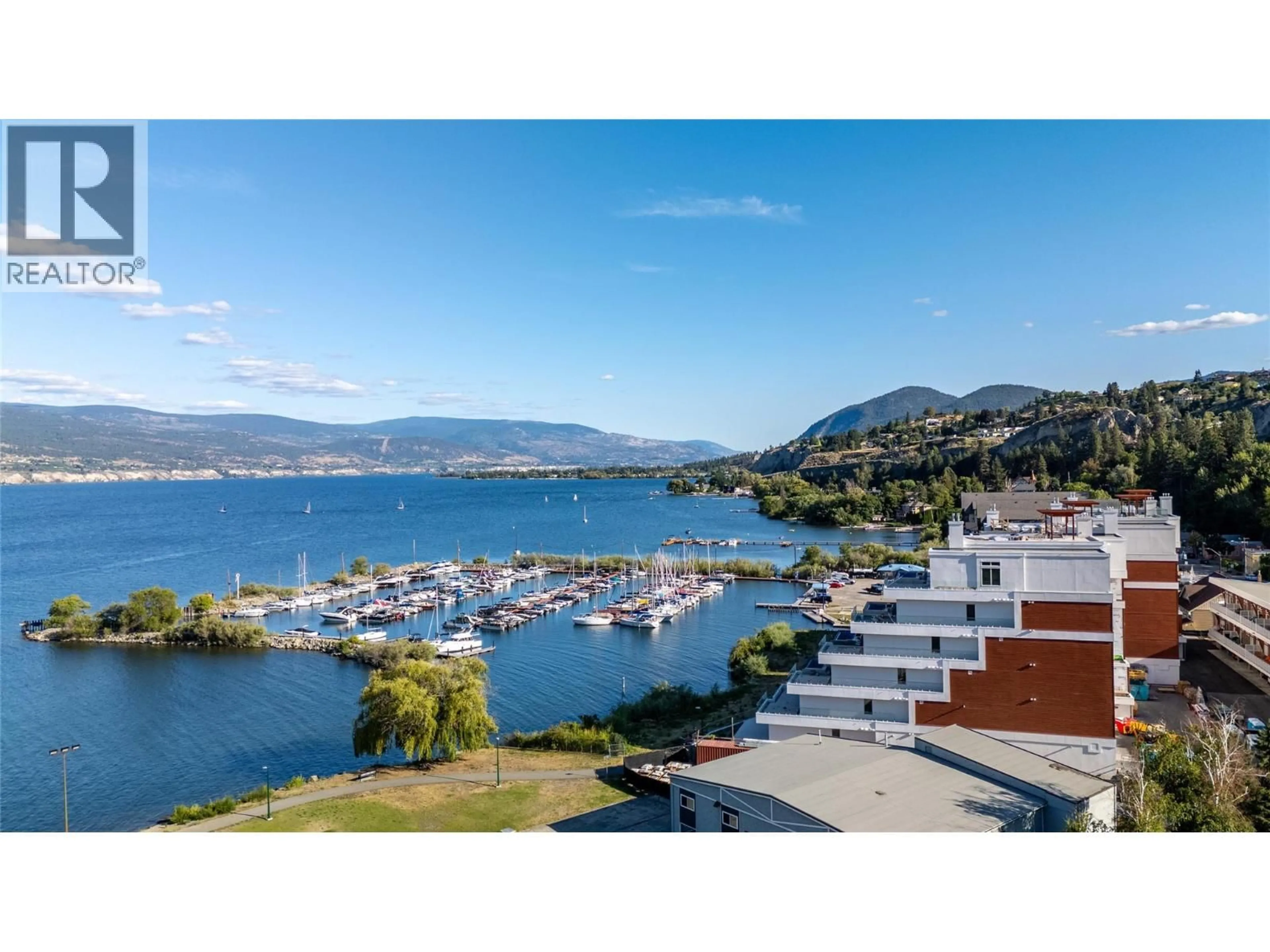A pic from outside/outdoor area/front of a property/back of a property/a pic from drone, water/lake/river/ocean view for 401 - 13415 LAKESHORE DRIVE SOUTH, Summerland British Columbia V0H1Z1