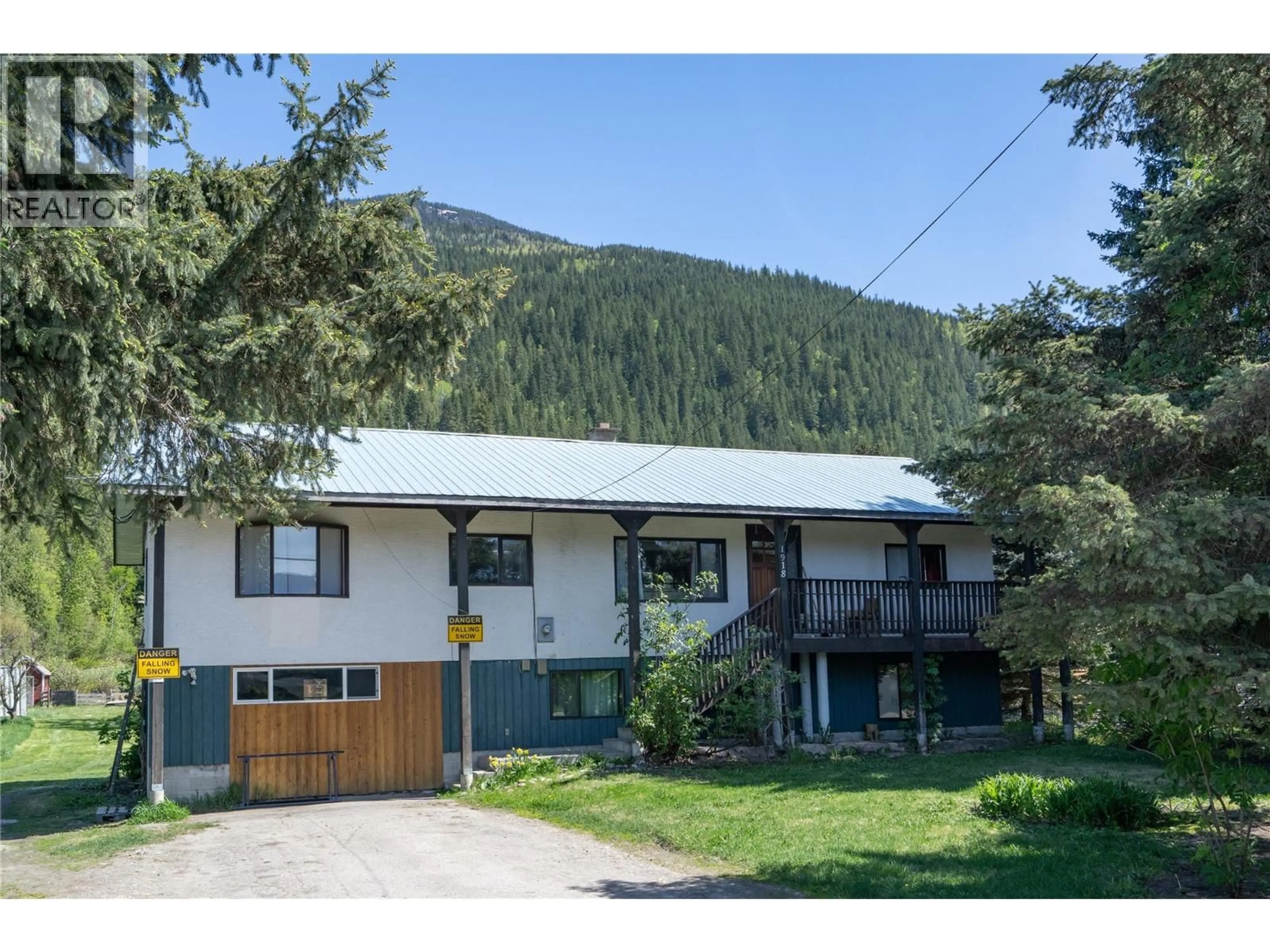 A pic from outside/outdoor area/front of a property/back of a property/a pic from drone, mountain view for 1918 CAMOZZI ROAD, Revelstoke British Columbia V0E2S0
