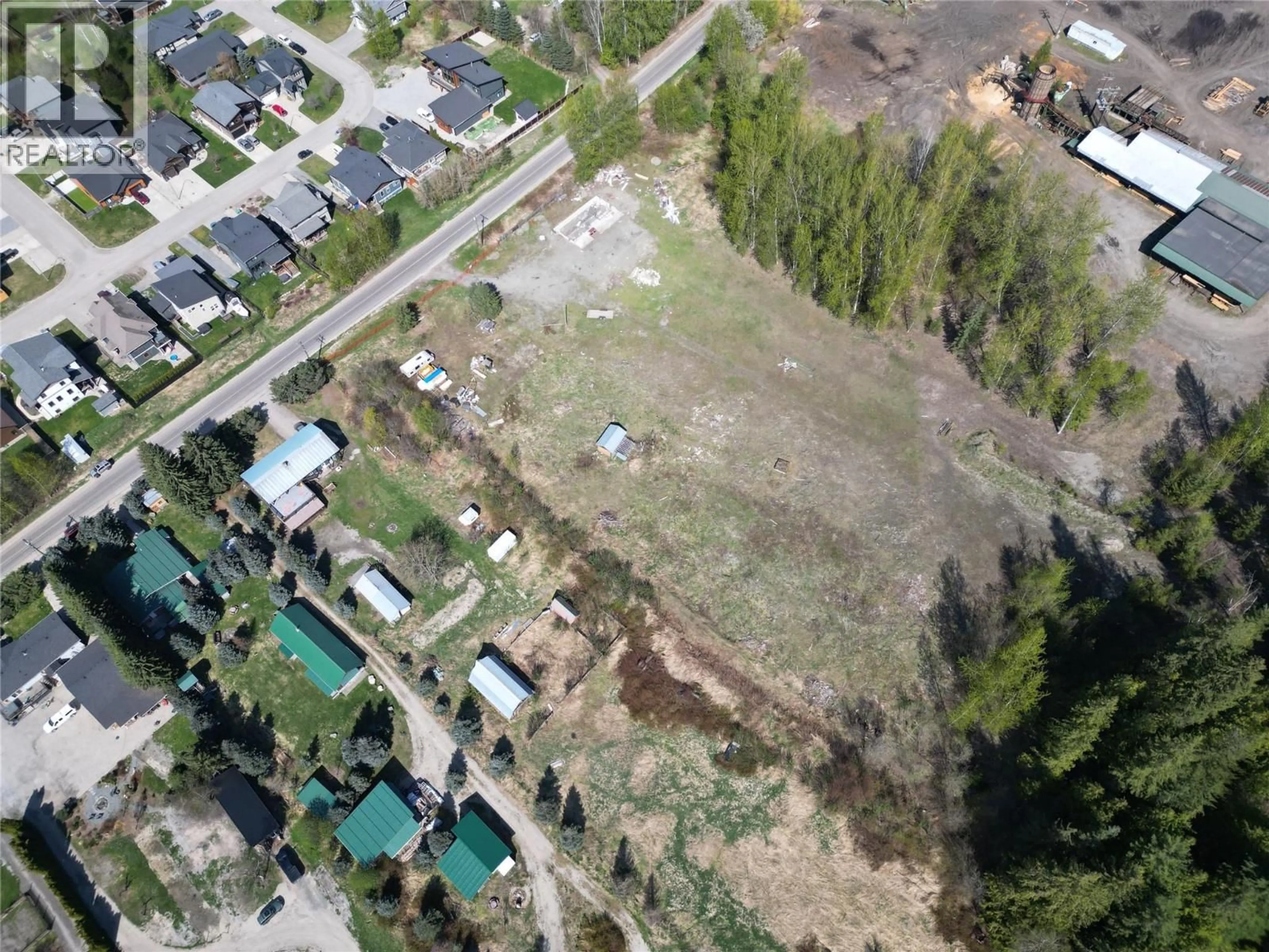 A pic from outside/outdoor area/front of a property/back of a property/a pic from drone, street for 1918 CAMOZZI ROAD, Revelstoke British Columbia V0E2S0