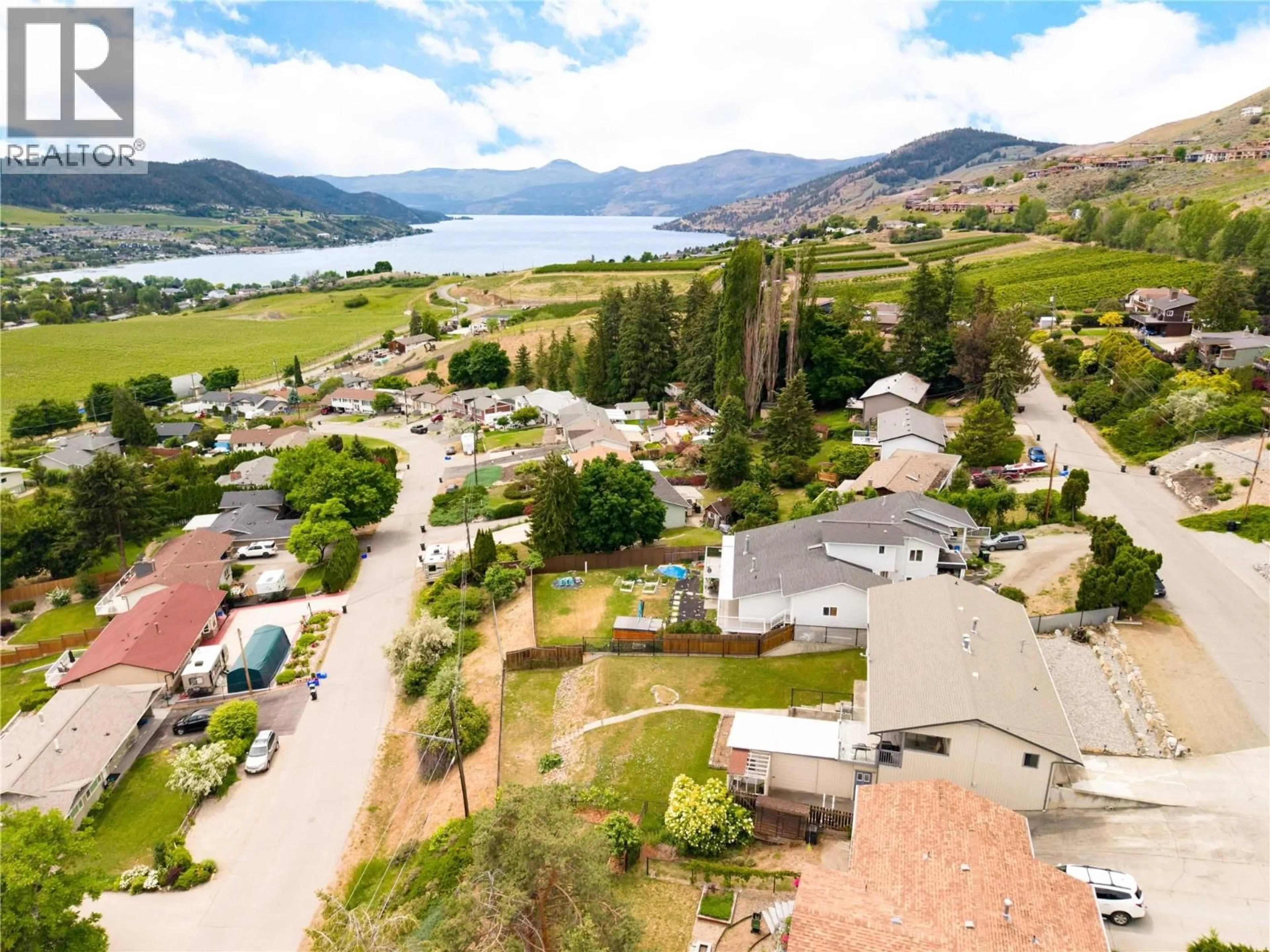 A pic from outside/outdoor area/front of a property/back of a property/a pic from drone, water/lake/river/ocean view for 6636 SOUTHWIND ROAD, Vernon British Columbia V1H1B7
