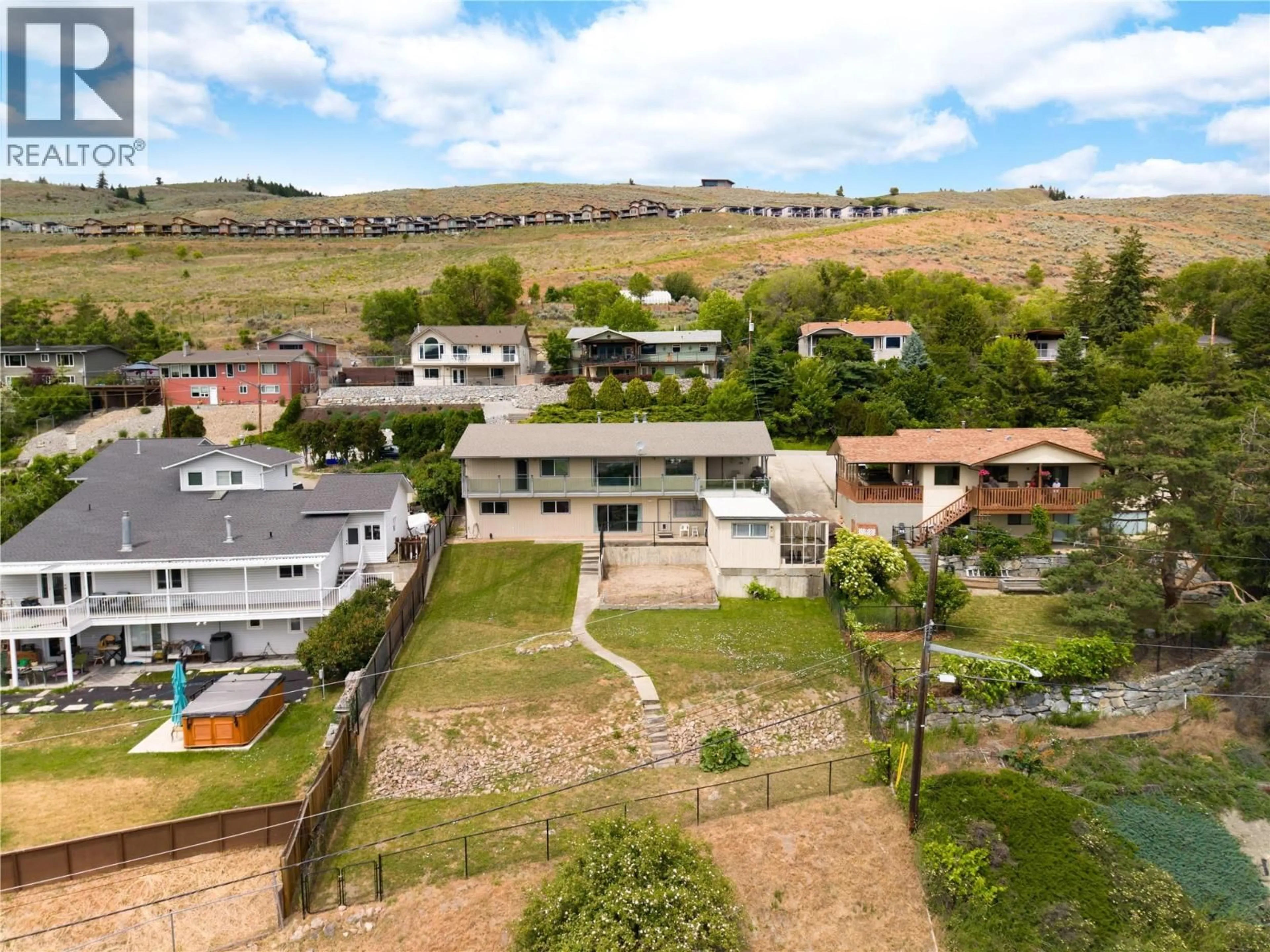 A pic from outside/outdoor area/front of a property/back of a property/a pic from drone, mountain view for 6636 SOUTHWIND ROAD, Vernon British Columbia V1H1B7