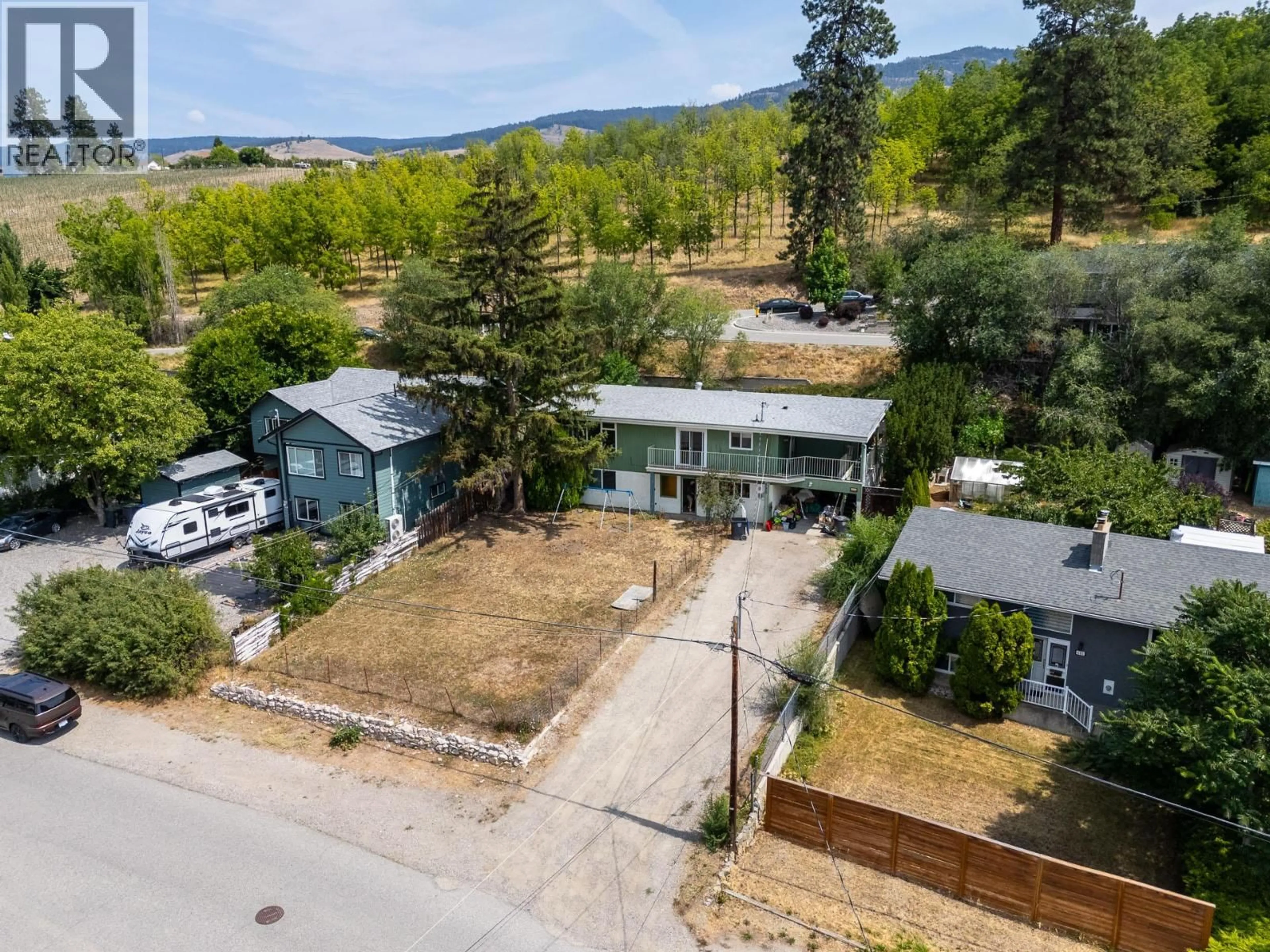 A pic from outside/outdoor area/front of a property/back of a property/a pic from drone, unknown for 695 GIRARD ROAD, Kelowna British Columbia V1X4V8