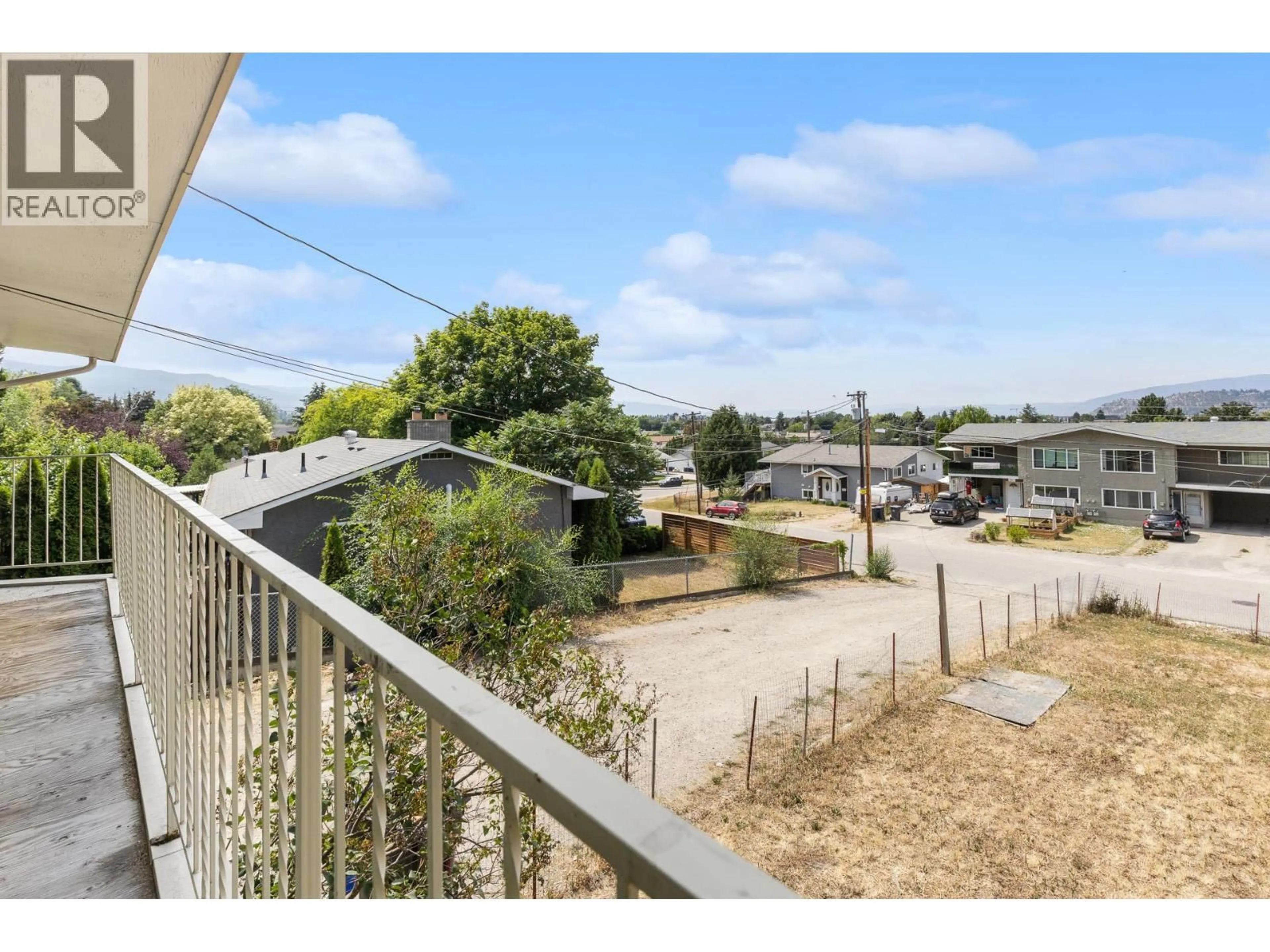 A pic from outside/outdoor area/front of a property/back of a property/a pic from drone, city buildings view from balcony for 695 GIRARD ROAD, Kelowna British Columbia V1X4V8
