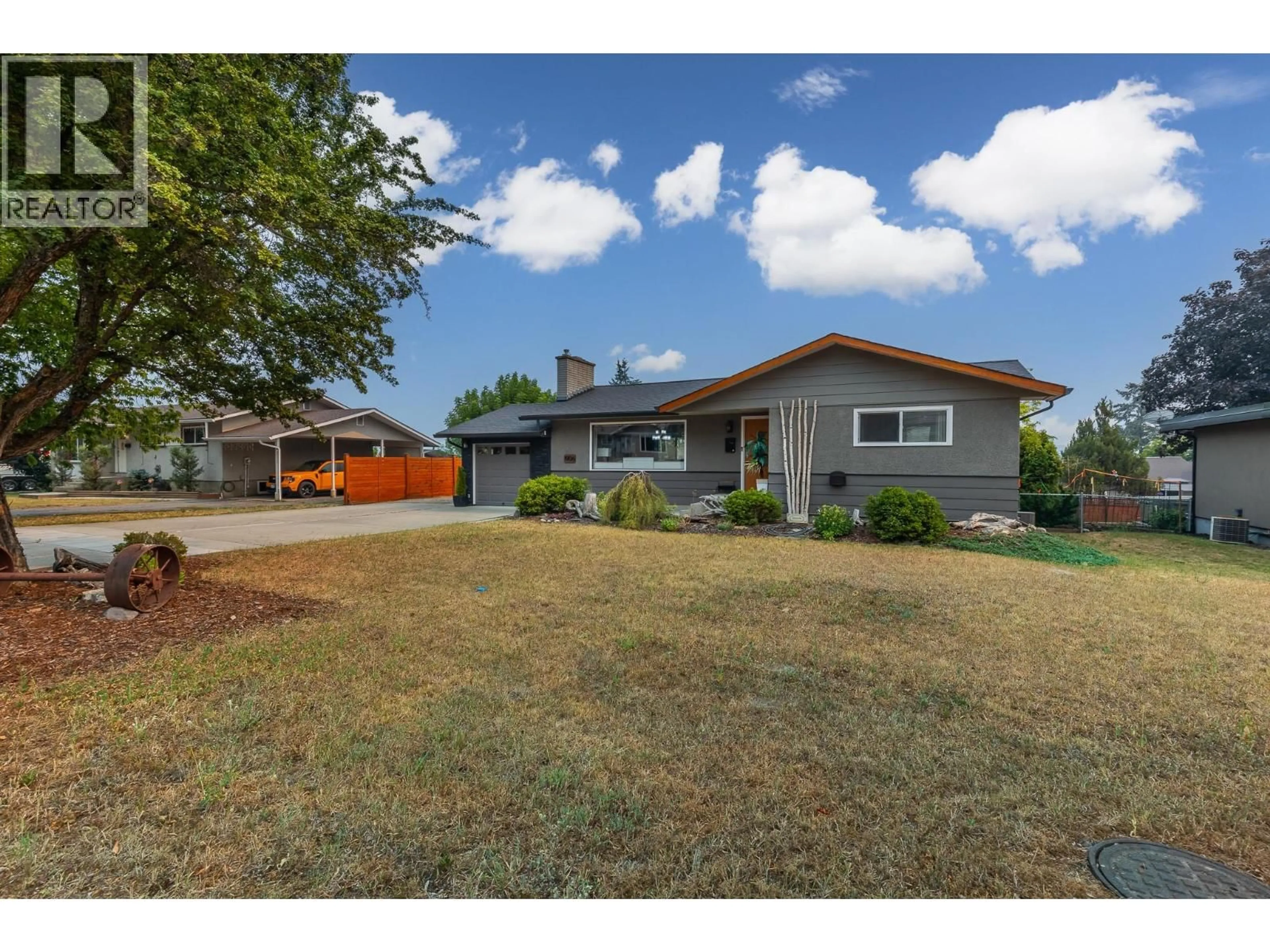 A pic from outside/outdoor area/front of a property/back of a property/a pic from drone, street for 1906 23 AVENUE, Vernon British Columbia V1T1J1