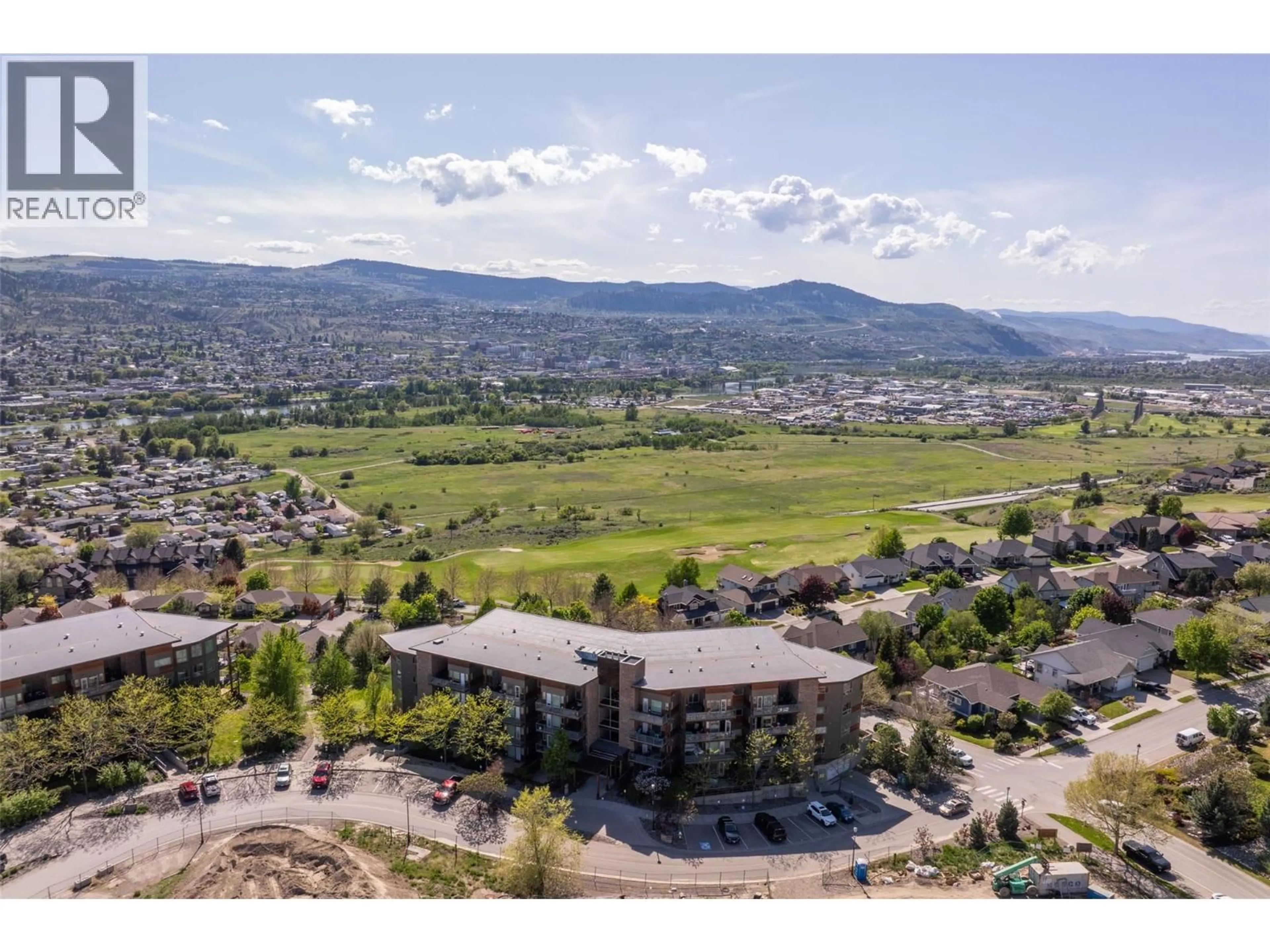 A pic from outside/outdoor area/front of a property/back of a property/a pic from drone, mountain view for 1306 - 1000 TALASA WAY, Kamloops British Columbia V2H0C2