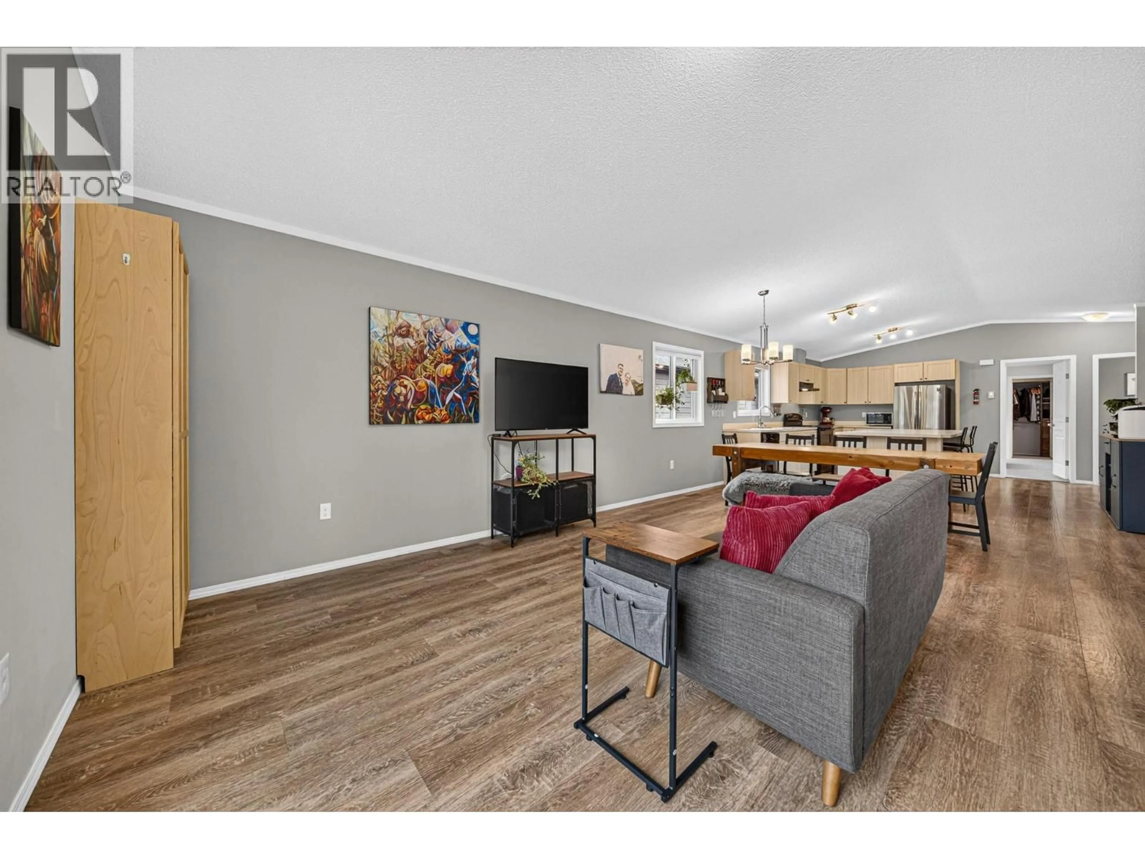 Living room with furniture, wood/laminate floor for 2064 GOLDEN EAGLE DRIVE, Sparwood British Columbia V0B2G2