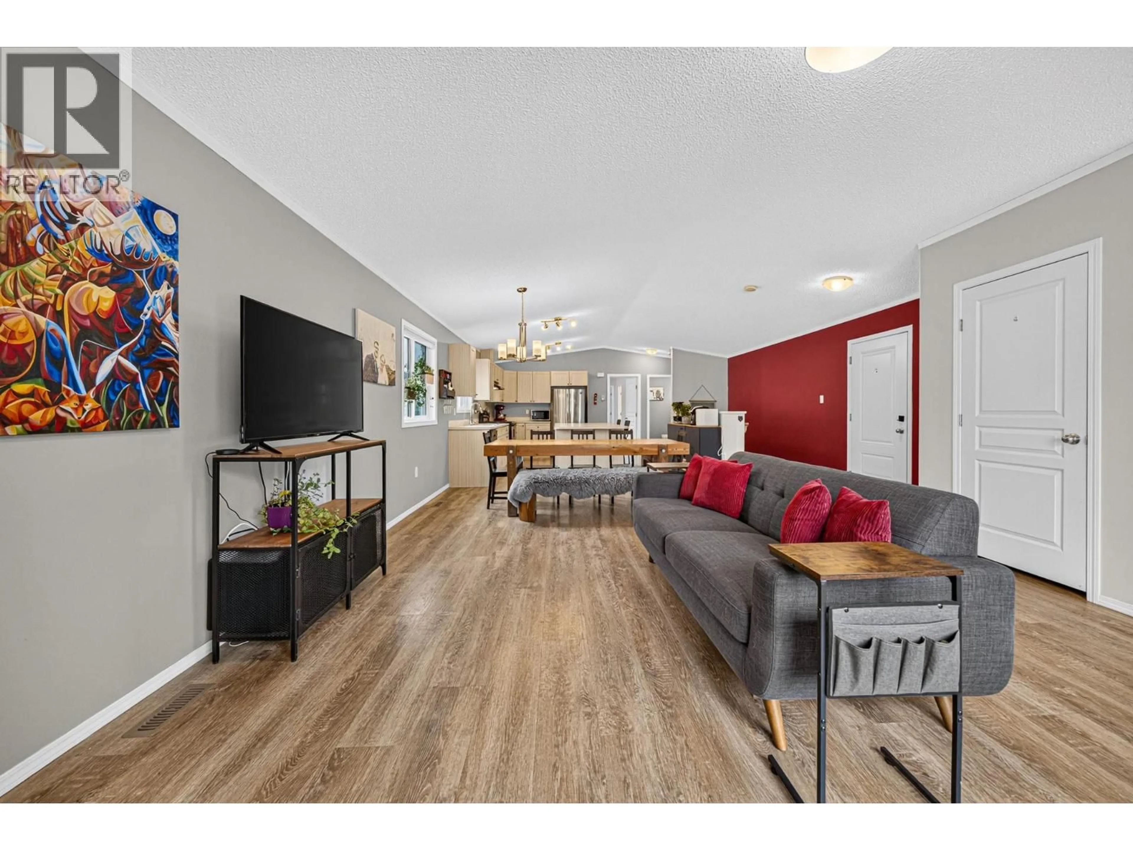 Living room with furniture, wood/laminate floor for 2064 GOLDEN EAGLE DRIVE, Sparwood British Columbia V0B2G2