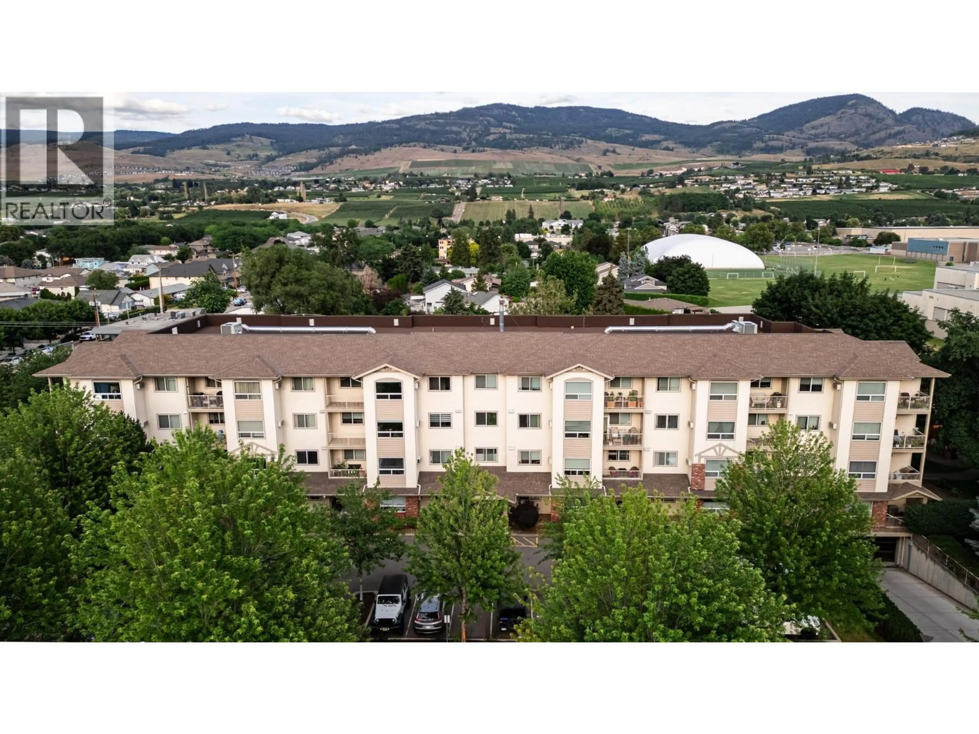 A pic from outside/outdoor area/front of a property/back of a property/a pic from drone, mountain view for 408 - 778 RUTLAND ROAD, Kelowna British Columbia V1X8B3