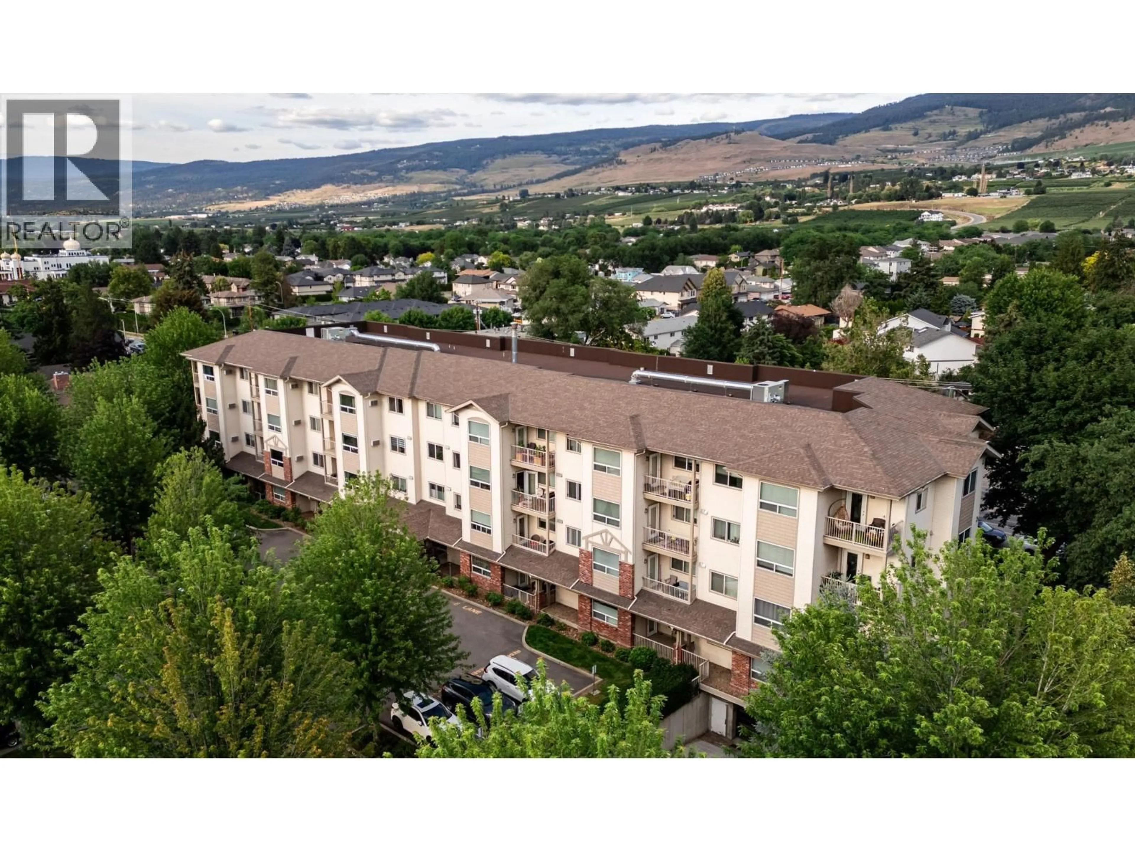 A pic from outside/outdoor area/front of a property/back of a property/a pic from drone, mountain view for 408 - 778 RUTLAND ROAD, Kelowna British Columbia V1X8B3