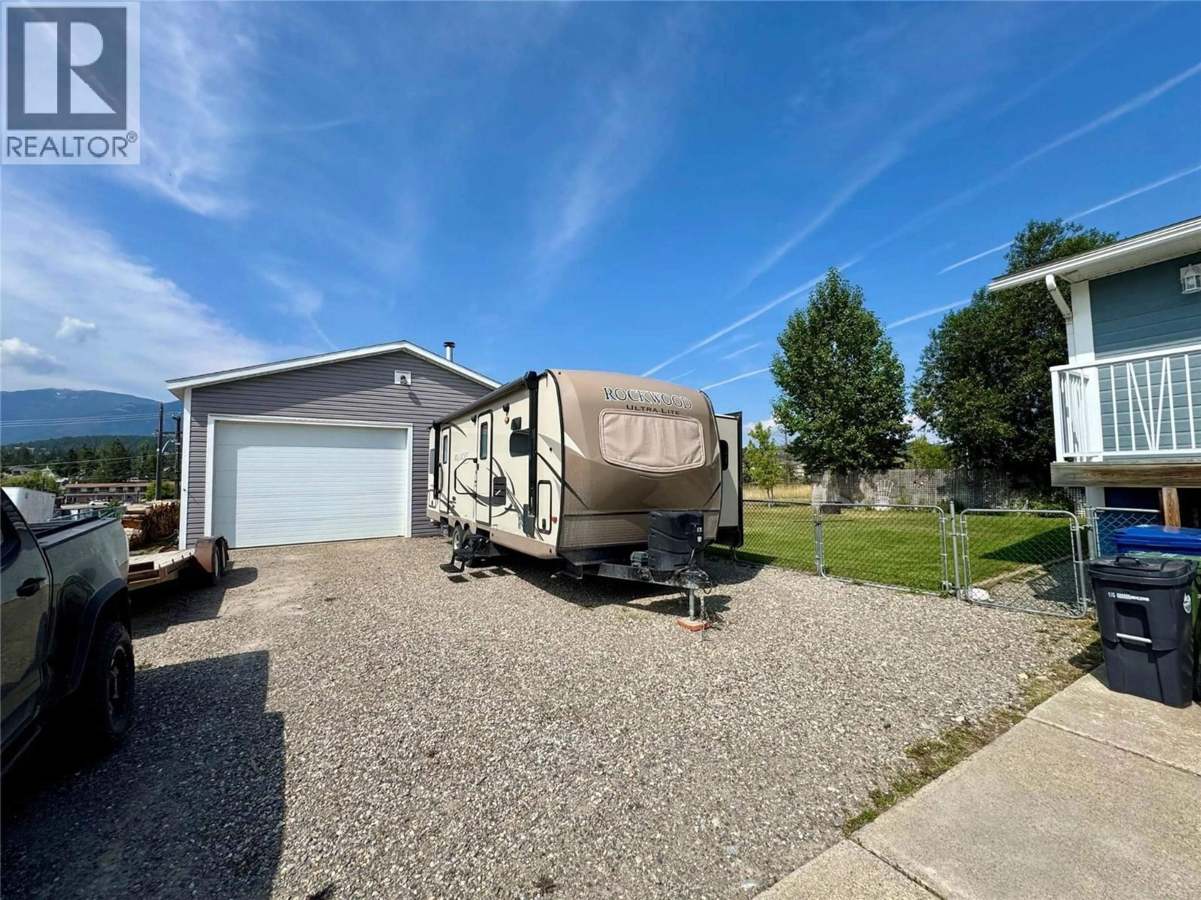 A pic from outside/outdoor area/front of a property/back of a property/a pic from drone, street for 910 5TH AVE AVENUE, Invermere British Columbia V0A1K0