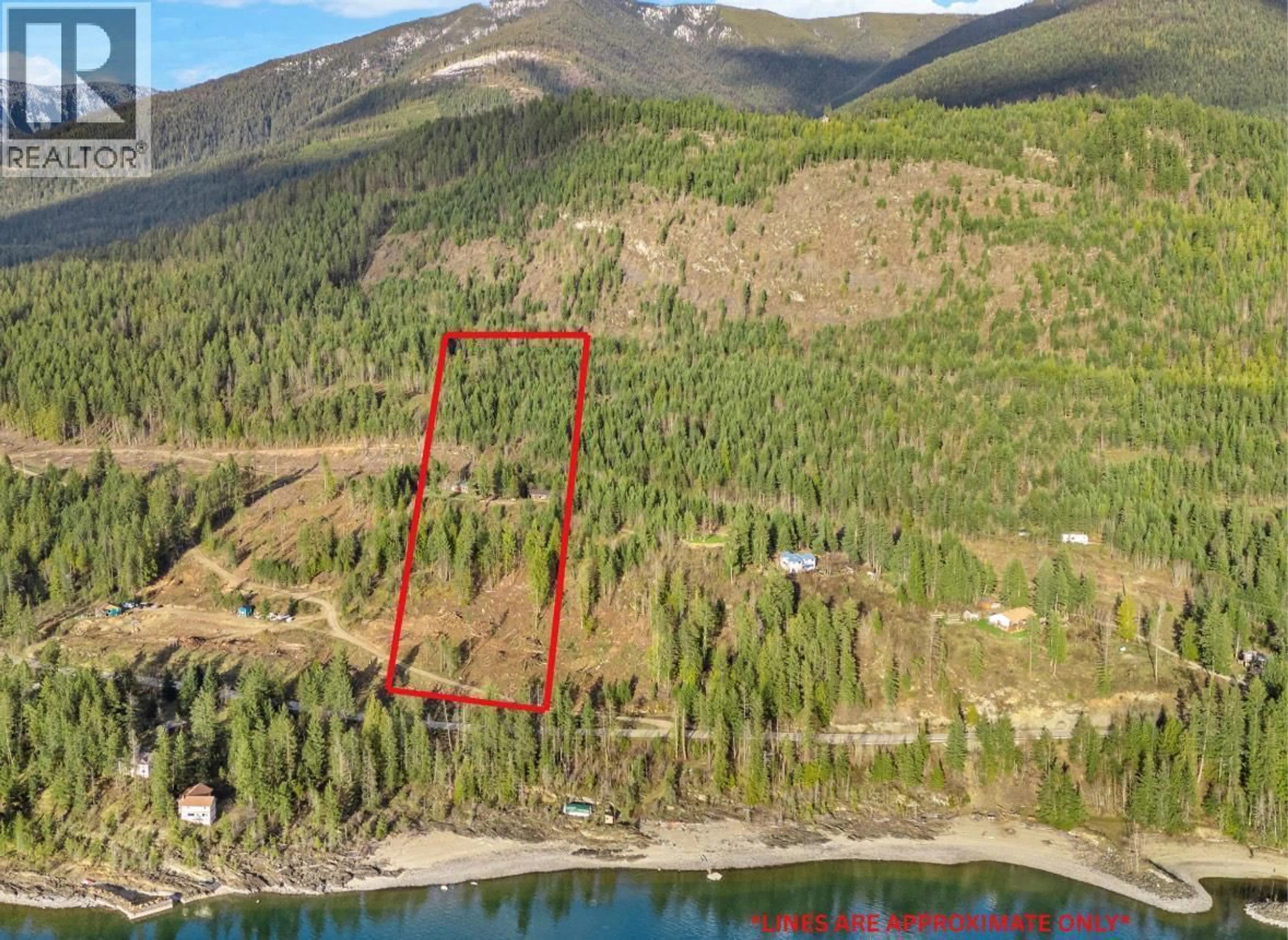 A pic from outside/outdoor area/front of a property/back of a property/a pic from drone, water/lake/river/ocean view for 14504 - & 14506 3A HIGHWAY, Gray Creek British Columbia V0B1S0