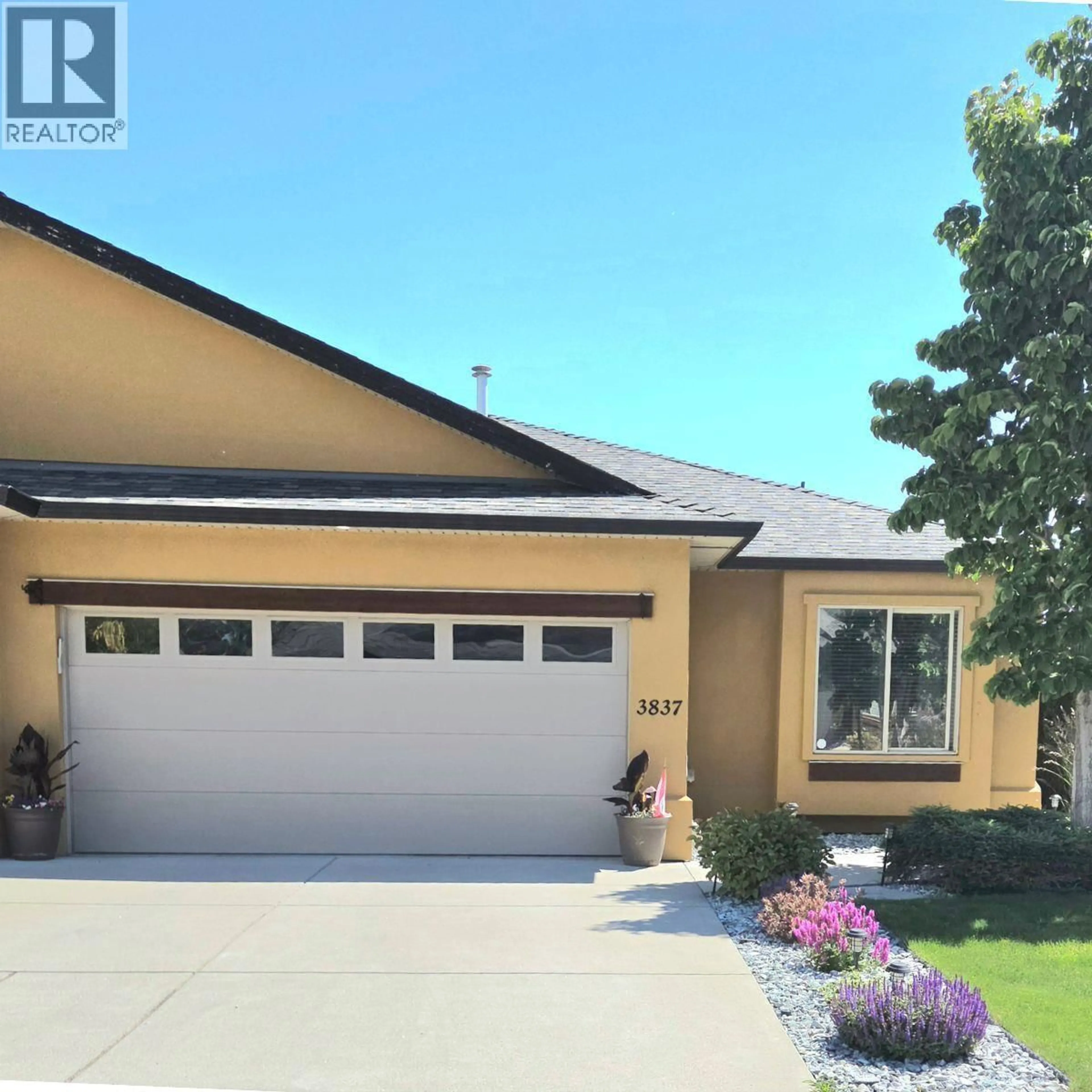 Home with vinyl exterior material, street for 3837 SONOMA PINES DRIVE, West Kelowna British Columbia V4T2Z5