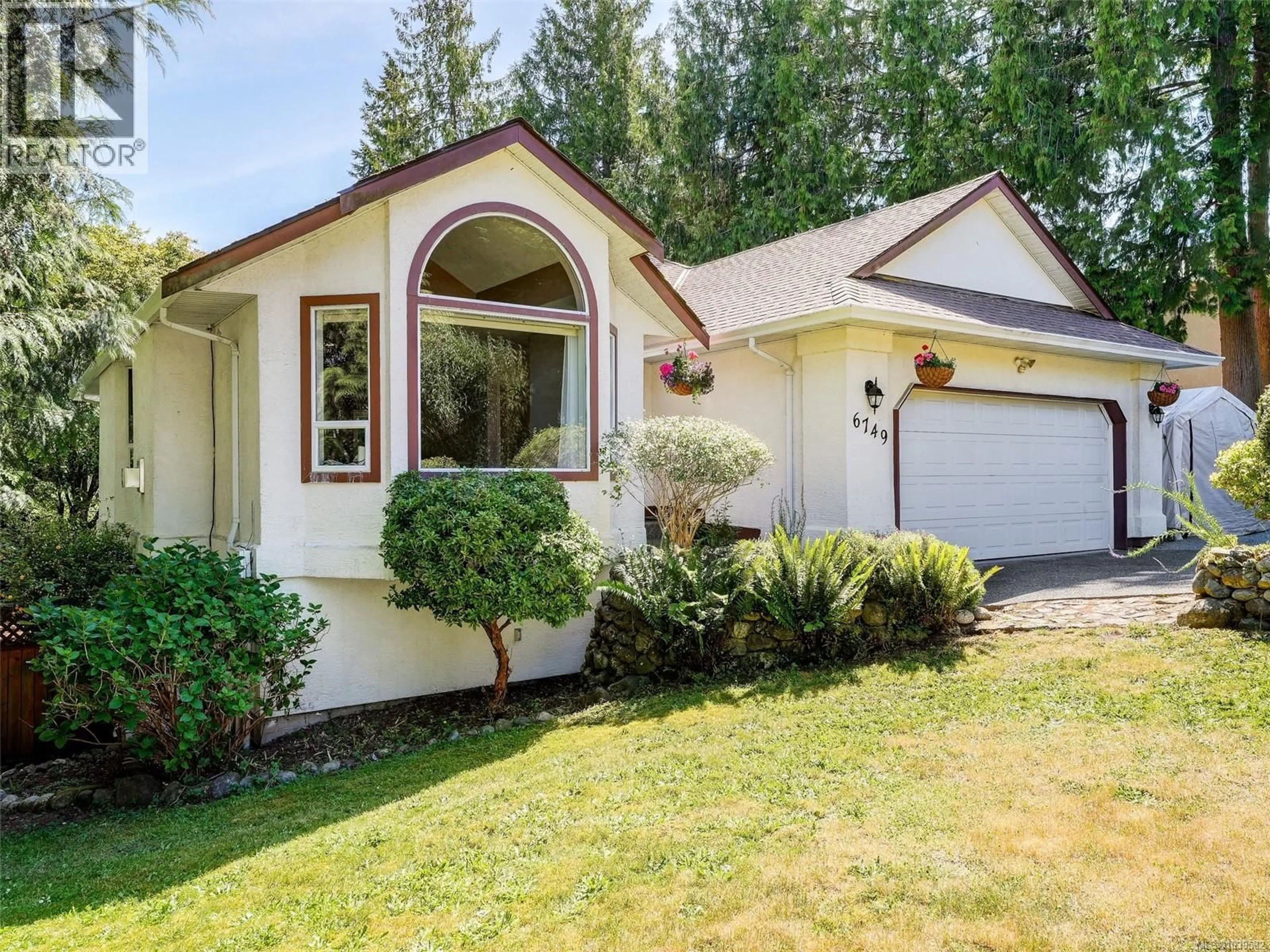 Home with vinyl exterior material, street for 6749 RHODONITE DRIVE, Sooke British Columbia V9Z0H7