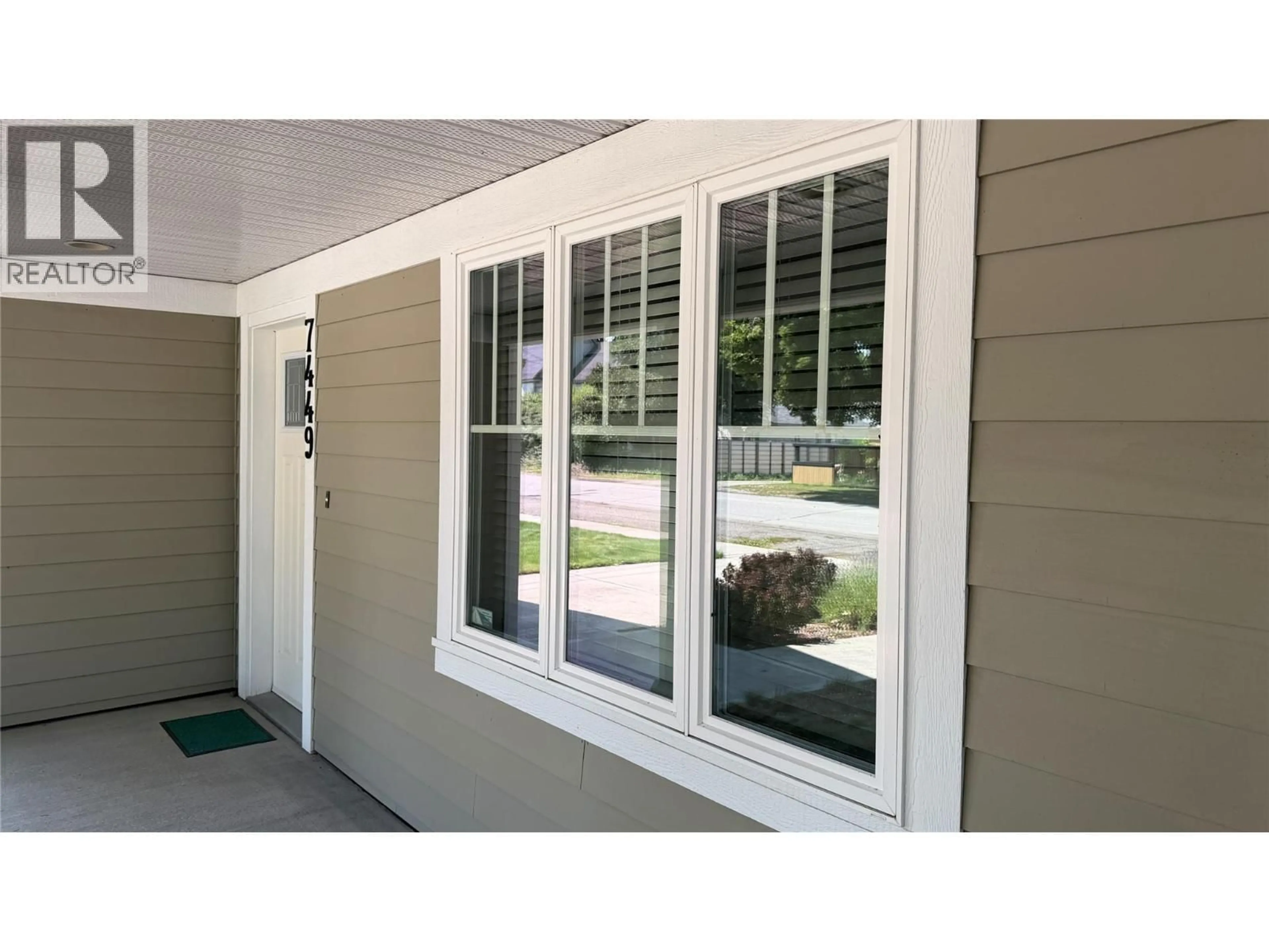 Home with vinyl exterior material, street for 7449 7TH STREET, Grand Forks British Columbia V0H1H0