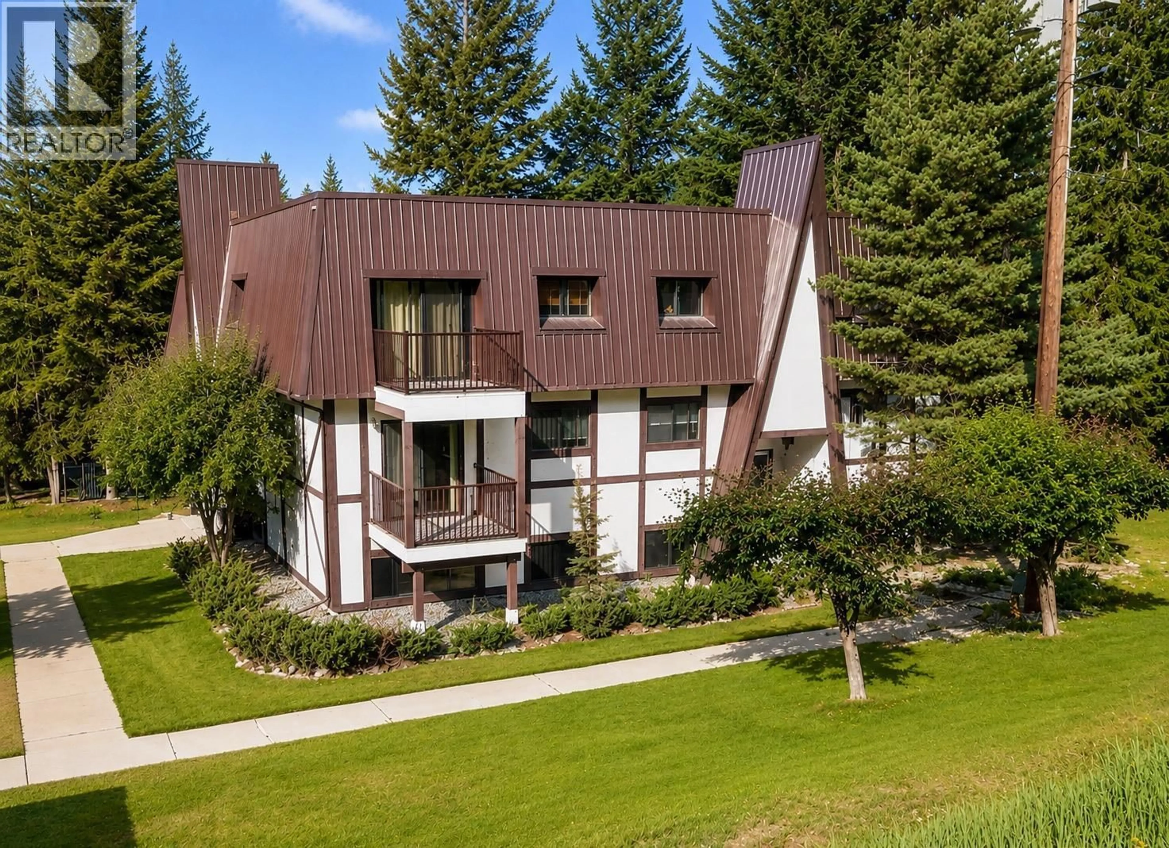 A pic from outside/outdoor area/front of a property/back of a property/a pic from drone, mountain view for 8 - 610 KNIGHTON ROAD, Kimberley British Columbia V1A1E2