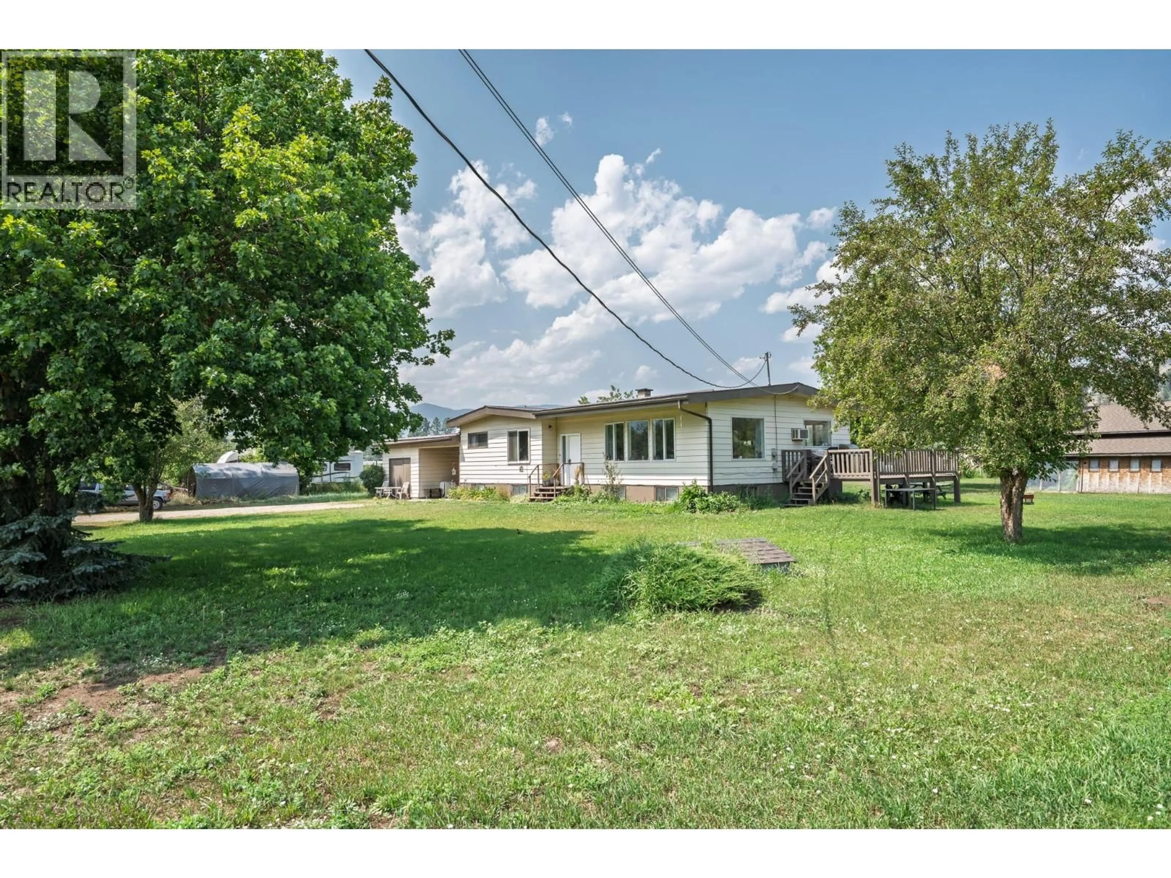 A pic from outside/outdoor area/front of a property/back of a property/a pic from drone, street for 6055 DARCY ROAD, Grand Forks British Columbia V0H1H4