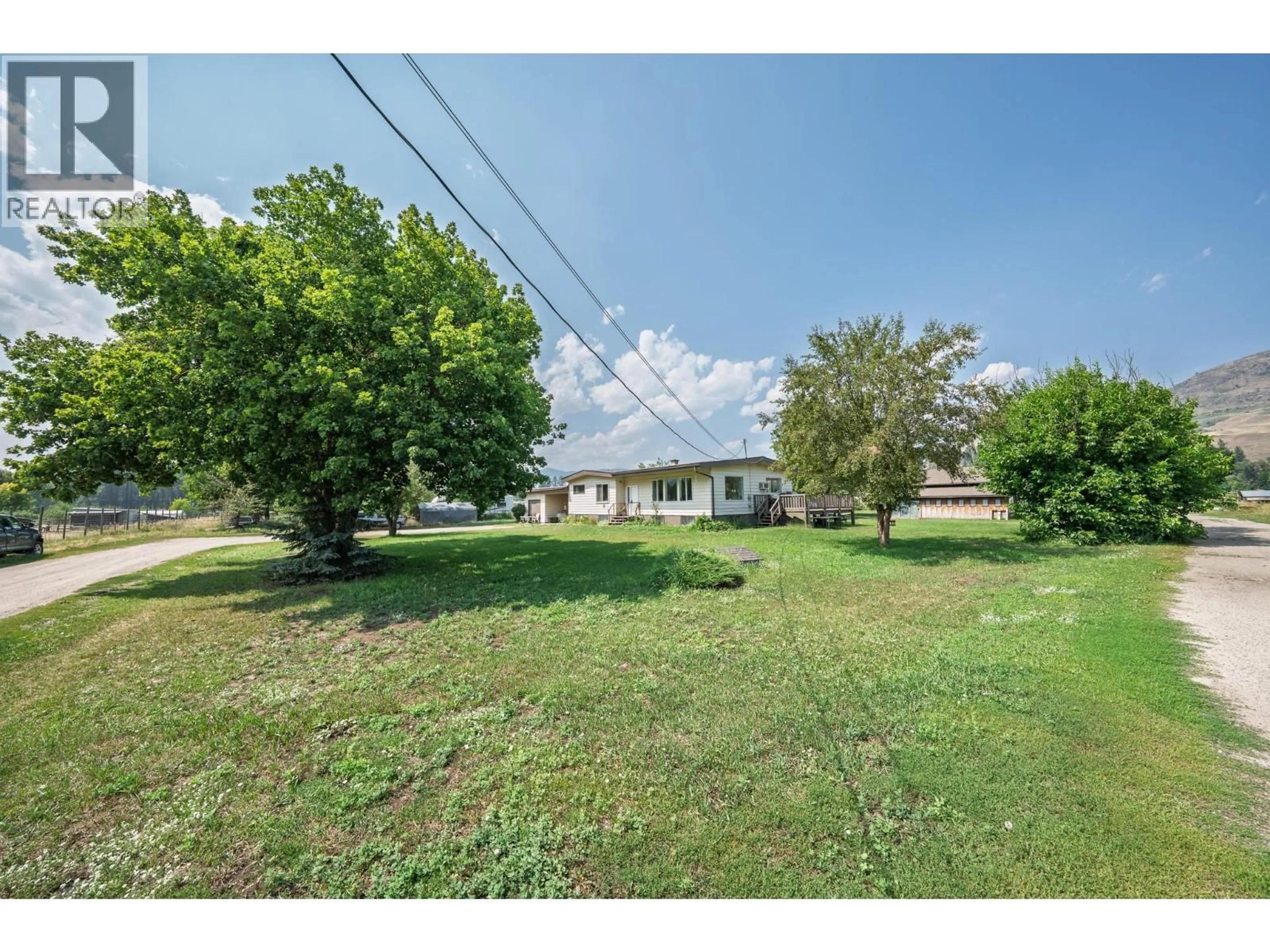 A pic from outside/outdoor area/front of a property/back of a property/a pic from drone, water/lake/river/ocean view for 6055 DARCY ROAD, Grand Forks British Columbia V0H1H4