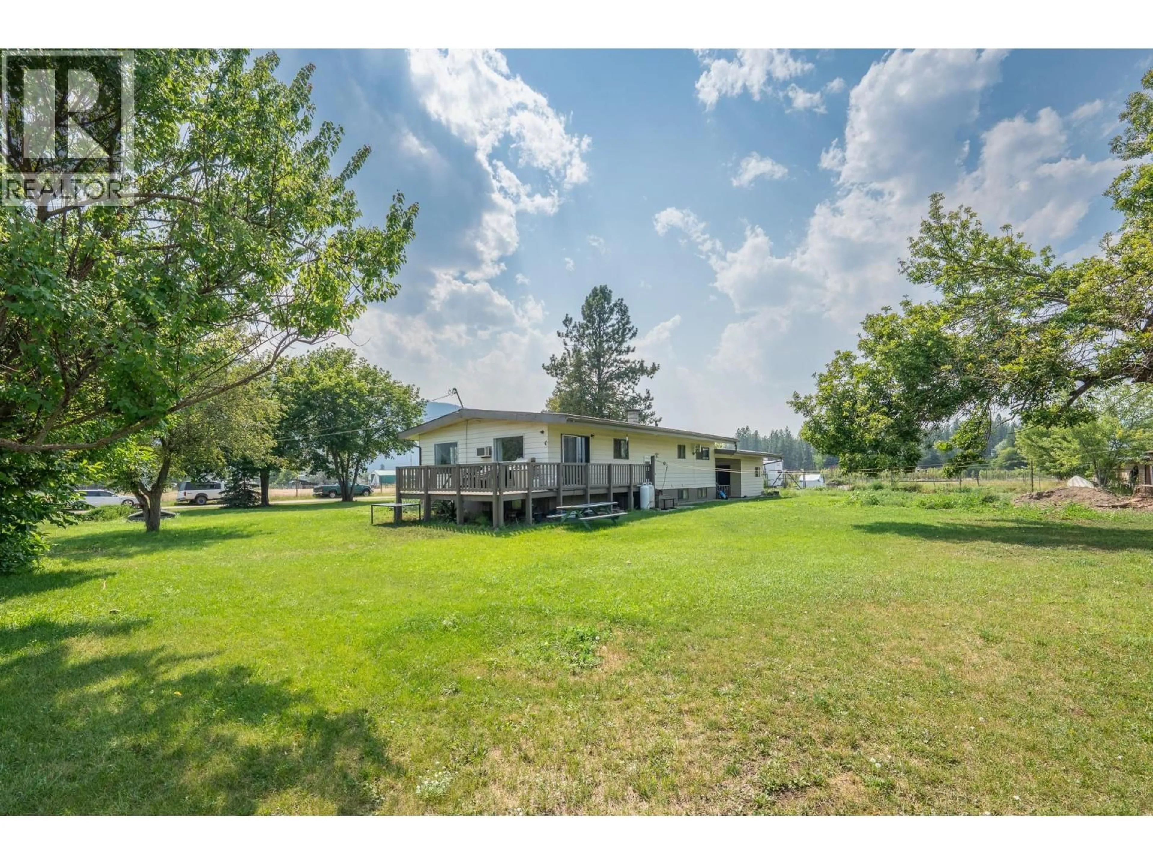 A pic from outside/outdoor area/front of a property/back of a property/a pic from drone, water/lake/river/ocean view for 6055 DARCY ROAD, Grand Forks British Columbia V0H1H4