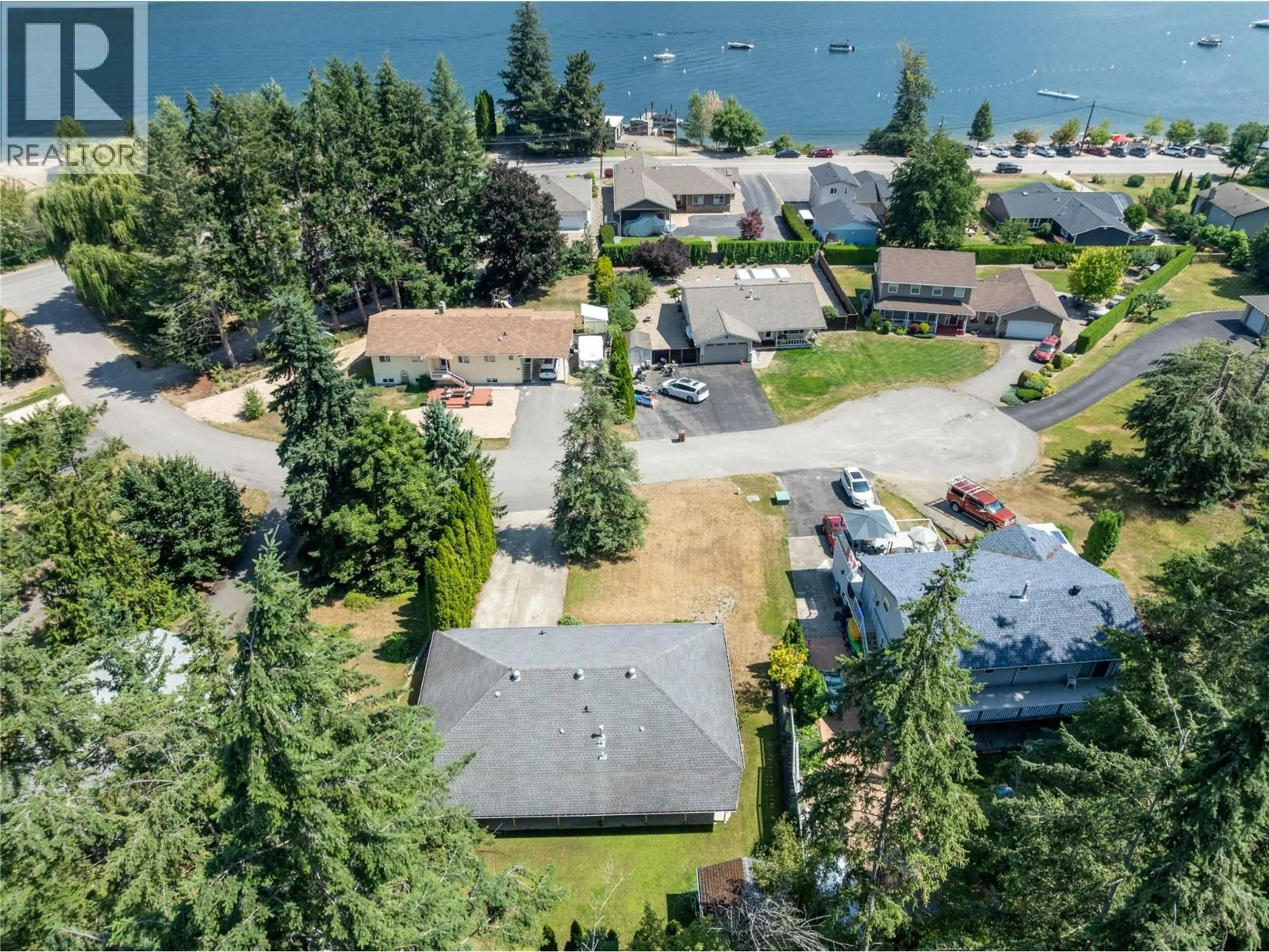 A pic from outside/outdoor area/front of a property/back of a property/a pic from drone, water/lake/river/ocean view for 2959 BIRCH LANE, Blind Bay British Columbia V0E1H2