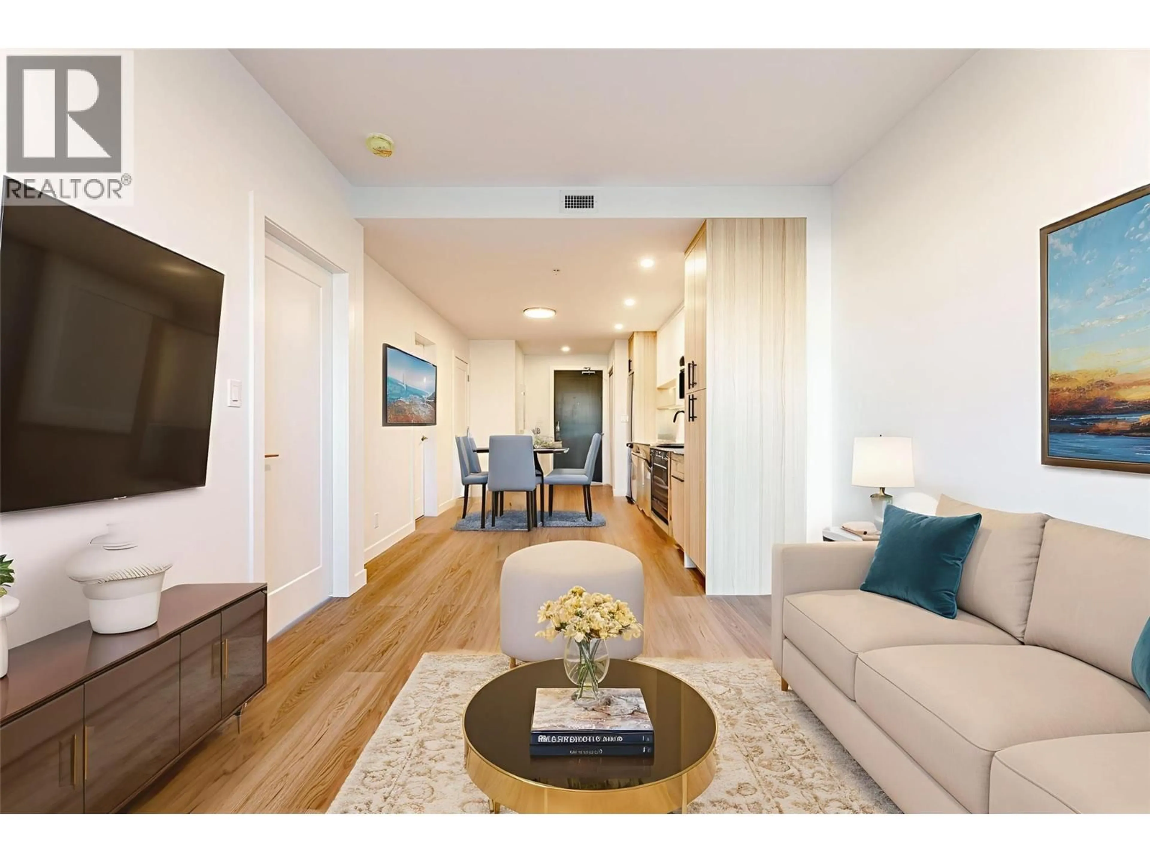 Living room with furniture, wood/laminate floor for 314 - 1380 PRIDHAM AVENUE, Kelowna British Columbia V1Y6B5