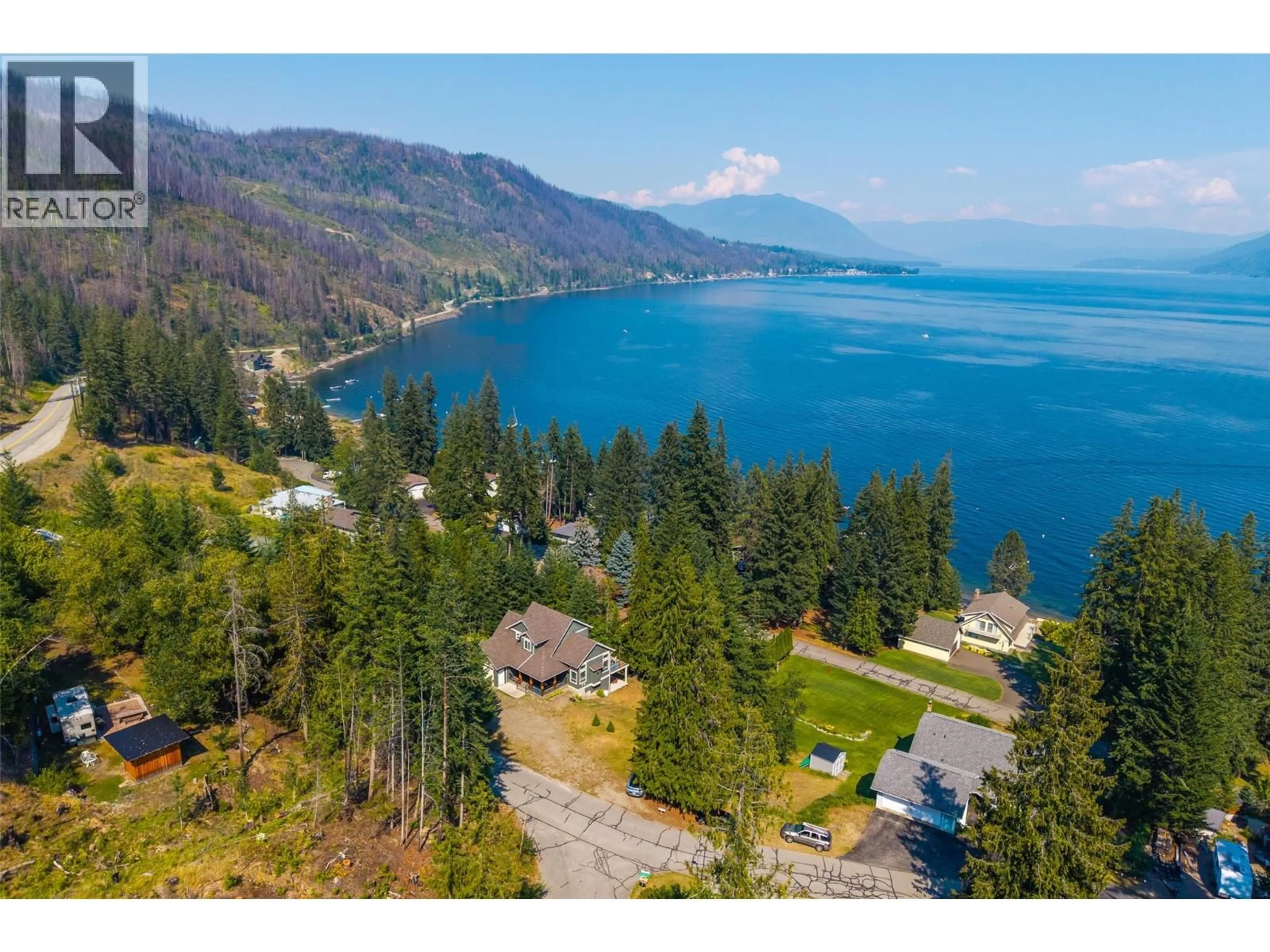 A pic from outside/outdoor area/front of a property/back of a property/a pic from drone, water/lake/river/ocean view for 39 - 4498 SQUILAX ANGLEMONT ROAD, Scotch Creek British Columbia V0E1M5