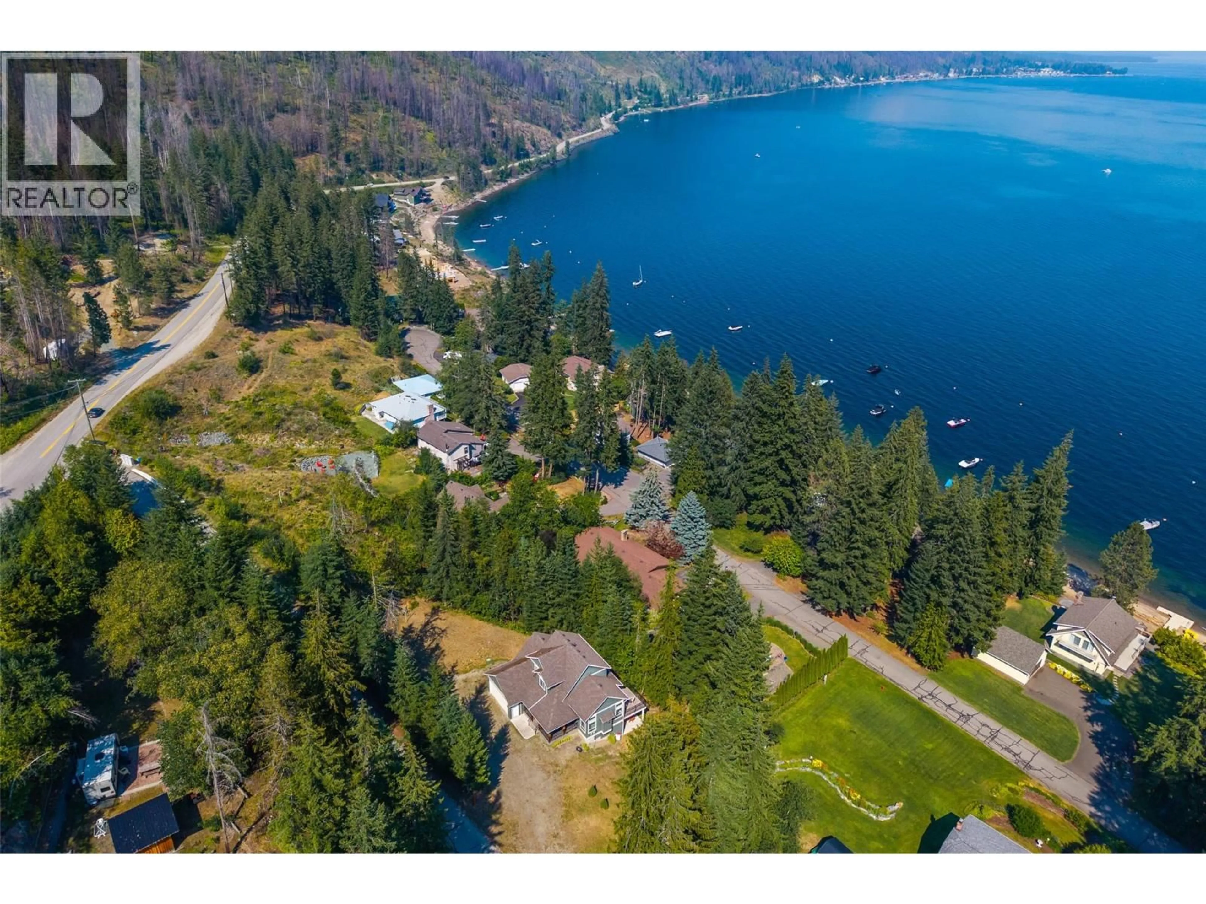 A pic from outside/outdoor area/front of a property/back of a property/a pic from drone, water/lake/river/ocean view for 39 - 4498 SQUILAX ANGLEMONT ROAD, Scotch Creek British Columbia V0E1M5