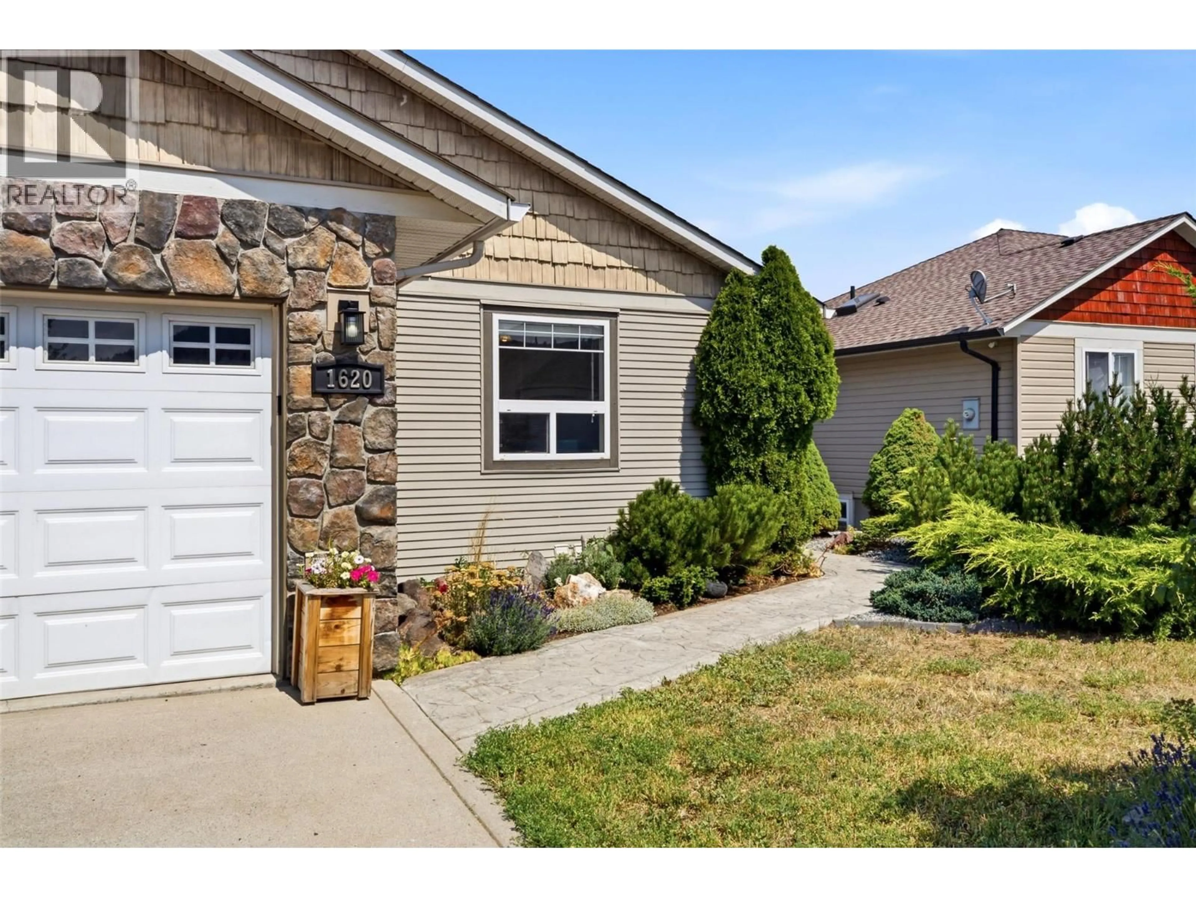 Home with vinyl exterior material, street for 1620 FIR ROAD, Merritt British Columbia V1K0A3