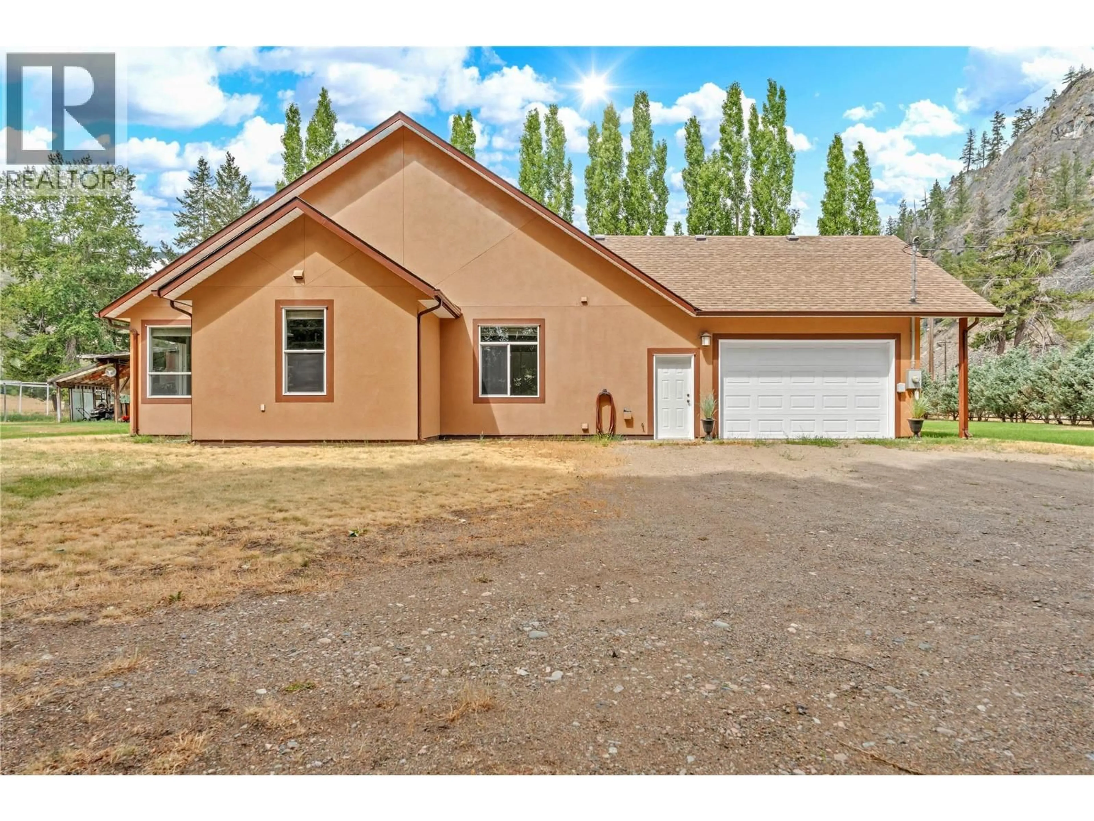 Home with vinyl exterior material, street for 1084 SEVEN MILE ROAD, Princeton British Columbia V0X1W0