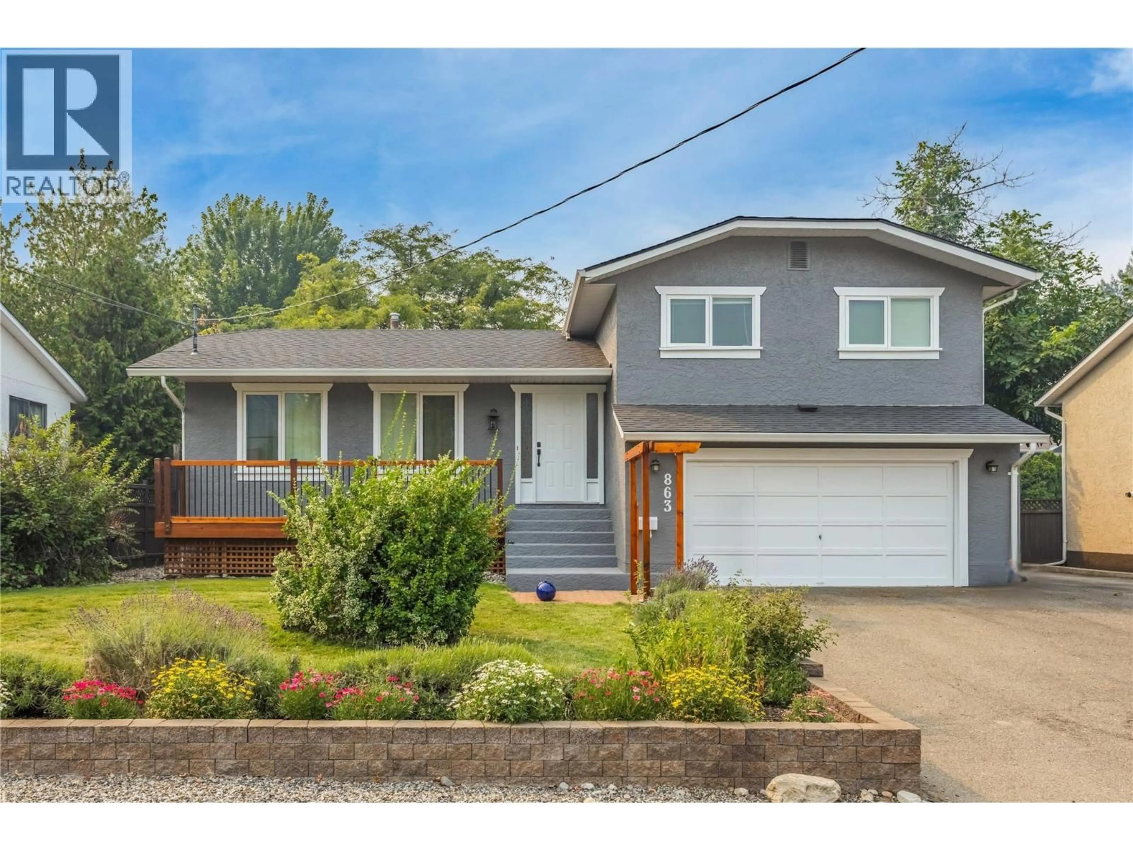 Home with vinyl exterior material, street for 863 HAMMER AVENUE, Kelowna British Columbia V1W2B7
