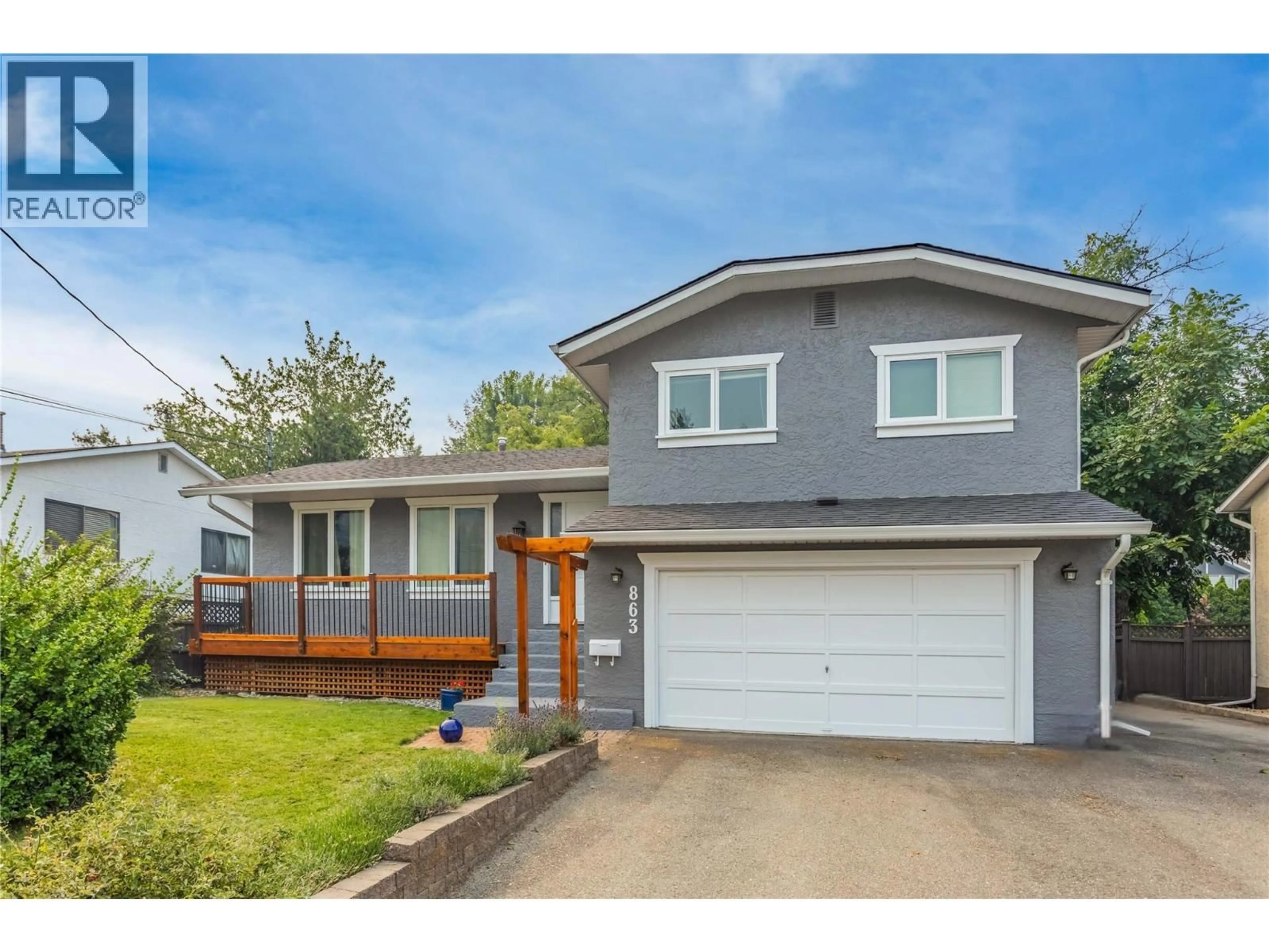 Home with vinyl exterior material, street for 863 HAMMER AVENUE, Kelowna British Columbia V1W2B7