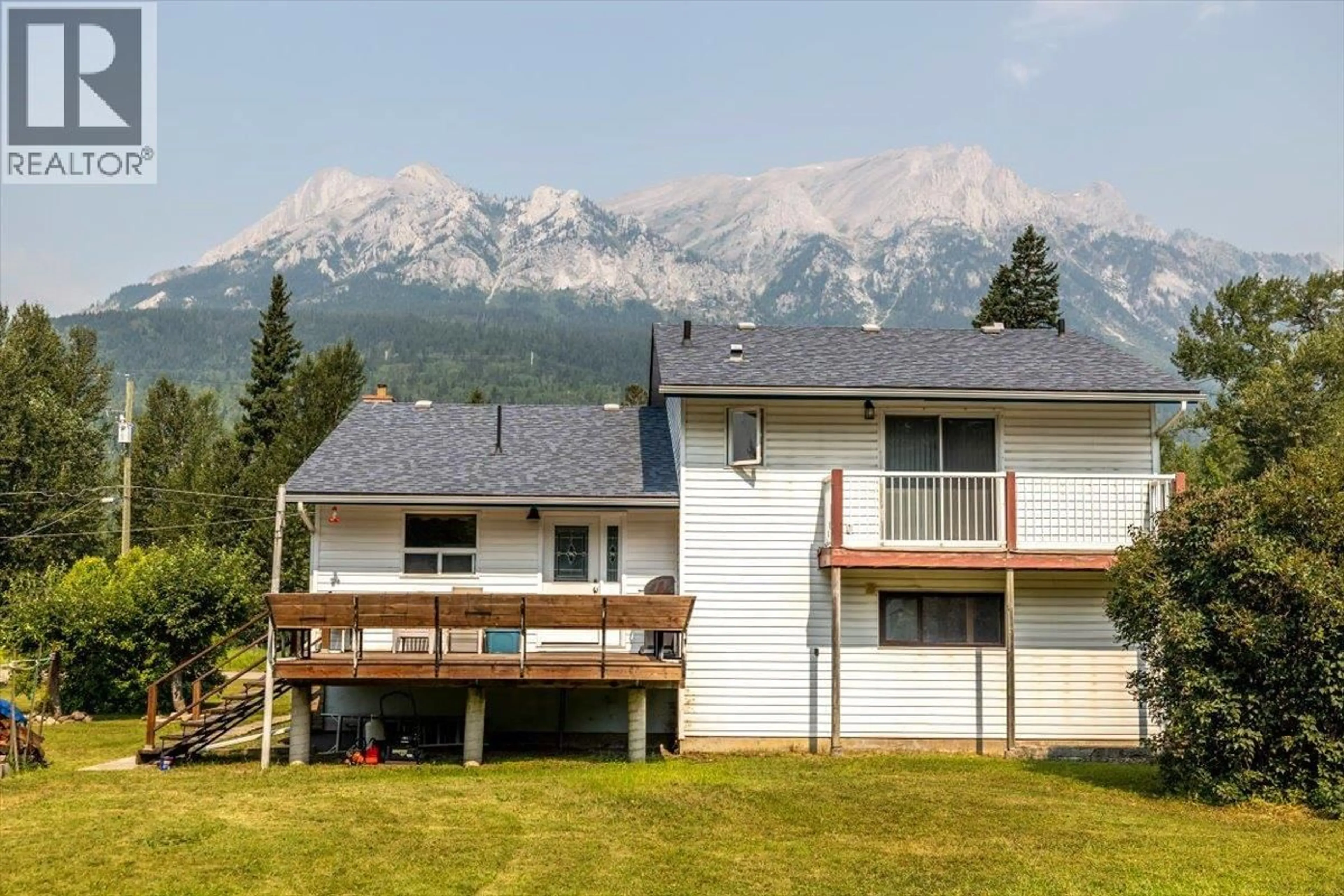 A pic from outside/outdoor area/front of a property/back of a property/a pic from drone, mountain view for 9878 VICTORIA STREET, Fernie British Columbia V0B1M5