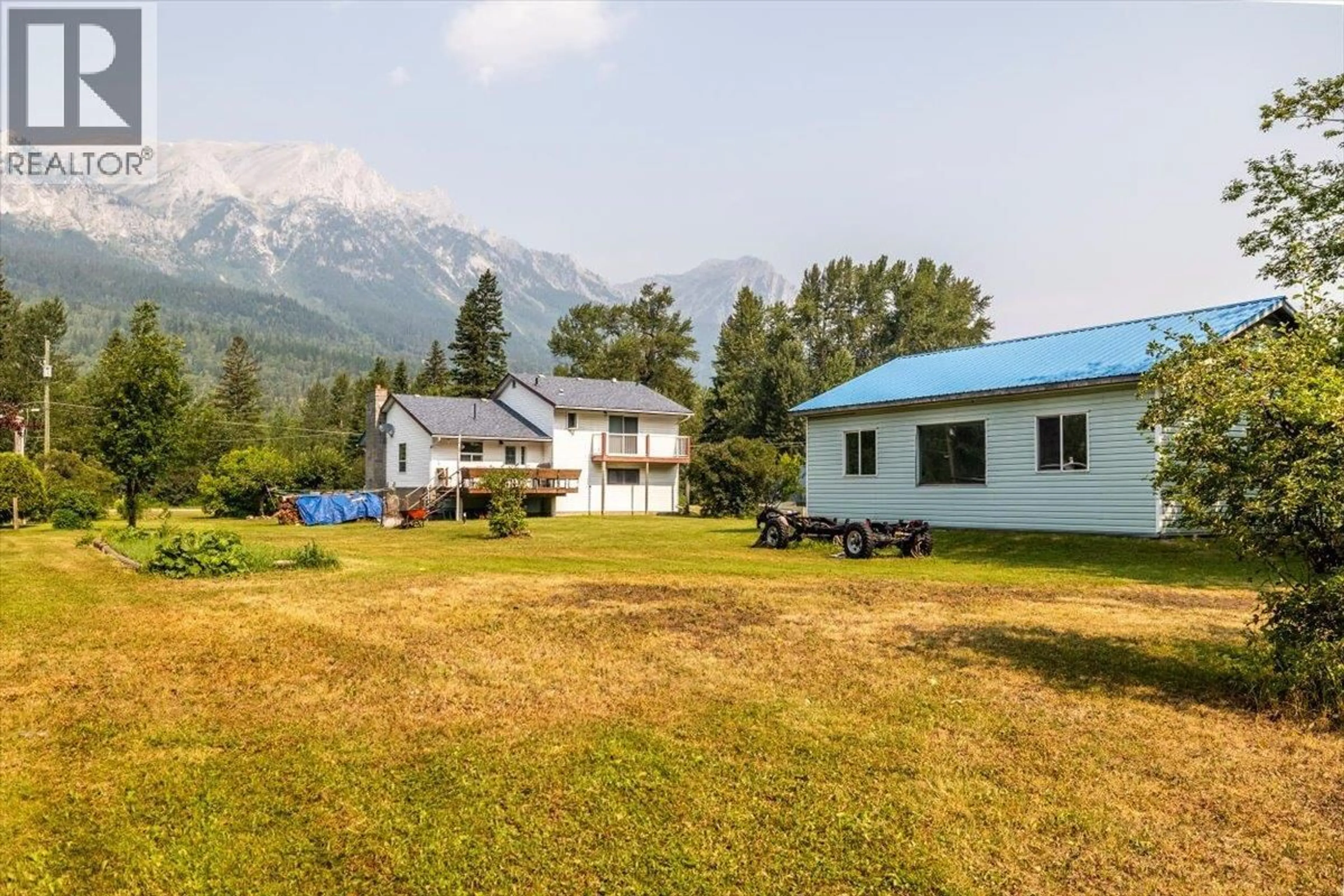 A pic from outside/outdoor area/front of a property/back of a property/a pic from drone, mountain view for 9878 VICTORIA STREET, Fernie British Columbia V0B1M5