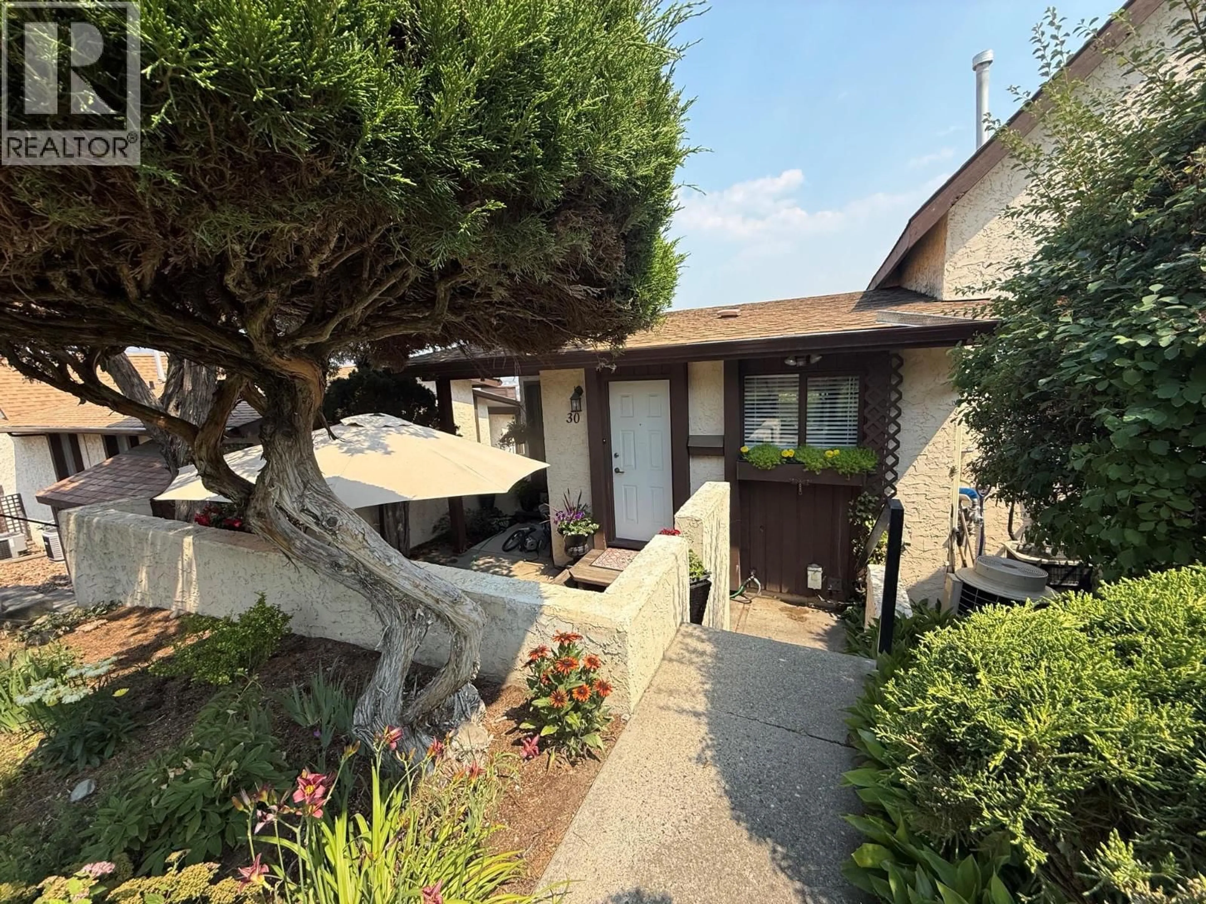 A pic from outside/outdoor area/front of a property/back of a property/a pic from drone, street for 30 - 290 PEMBERTON TERRACE, Kamloops British Columbia V2C6A9
