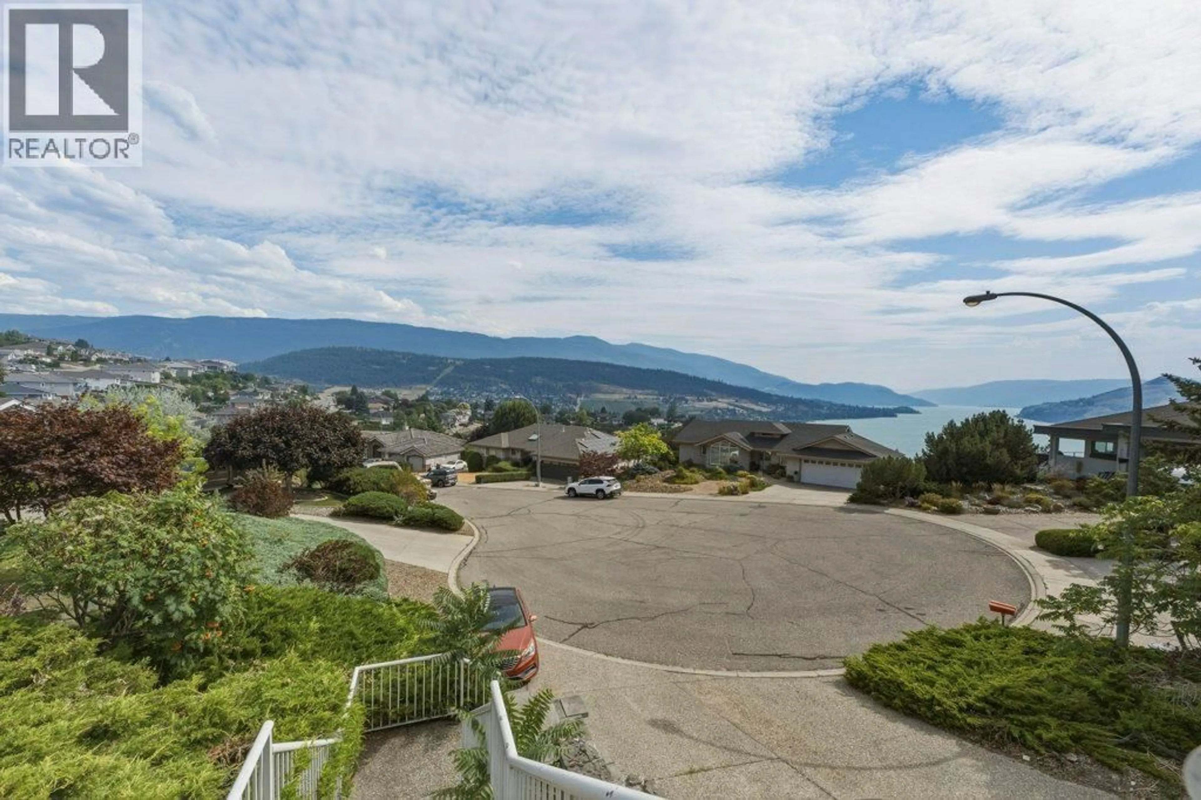 A pic from outside/outdoor area/front of a property/back of a property/a pic from drone, mountain view for 743 MT. THOR DRIVE, Coldstream British Columbia V1B2W1