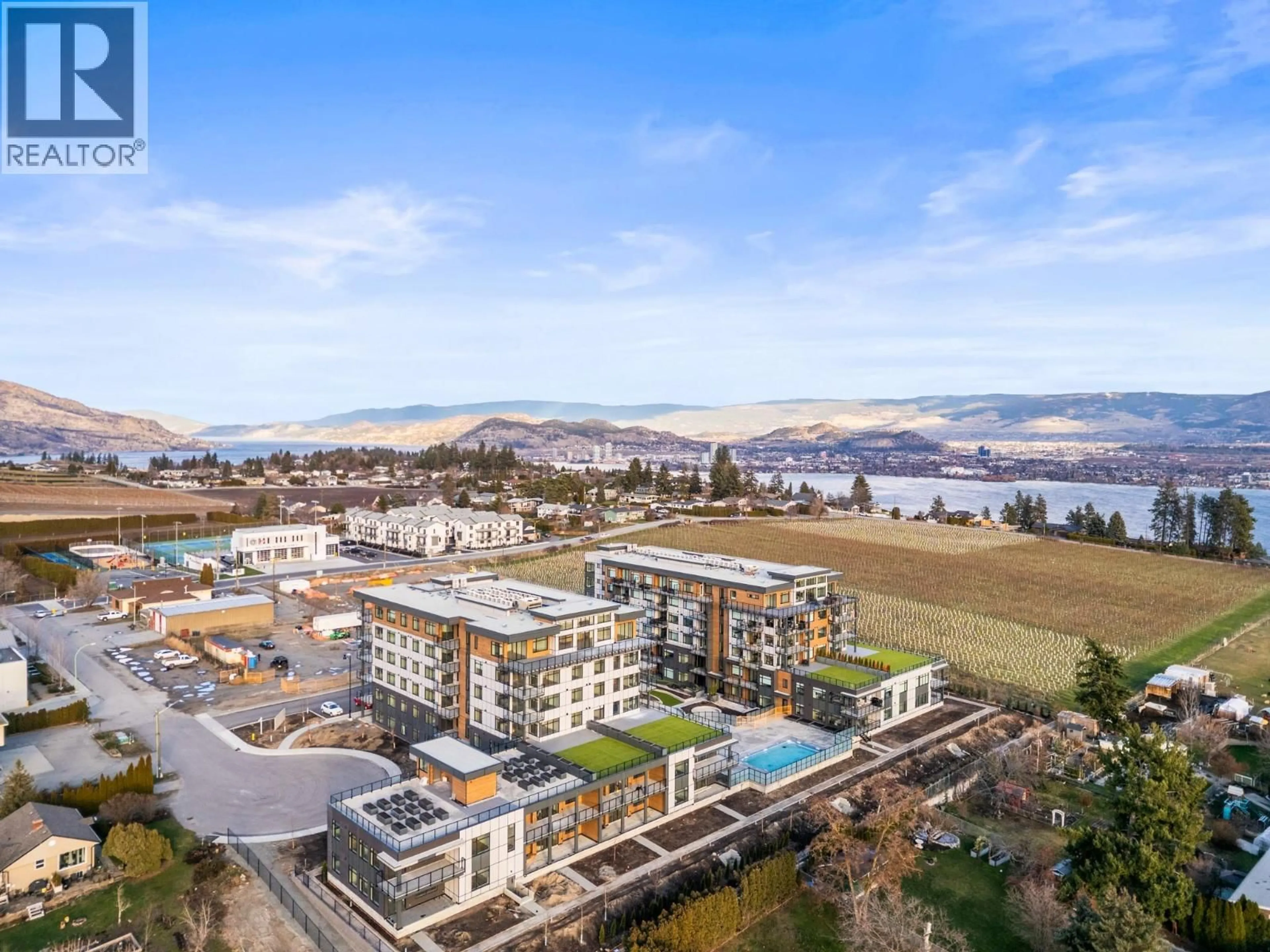 A pic from outside/outdoor area/front of a property/back of a property/a pic from drone, mountain view for 207 - 2760 OLALLA ROAD, West Kelowna British Columbia V1Z2A9