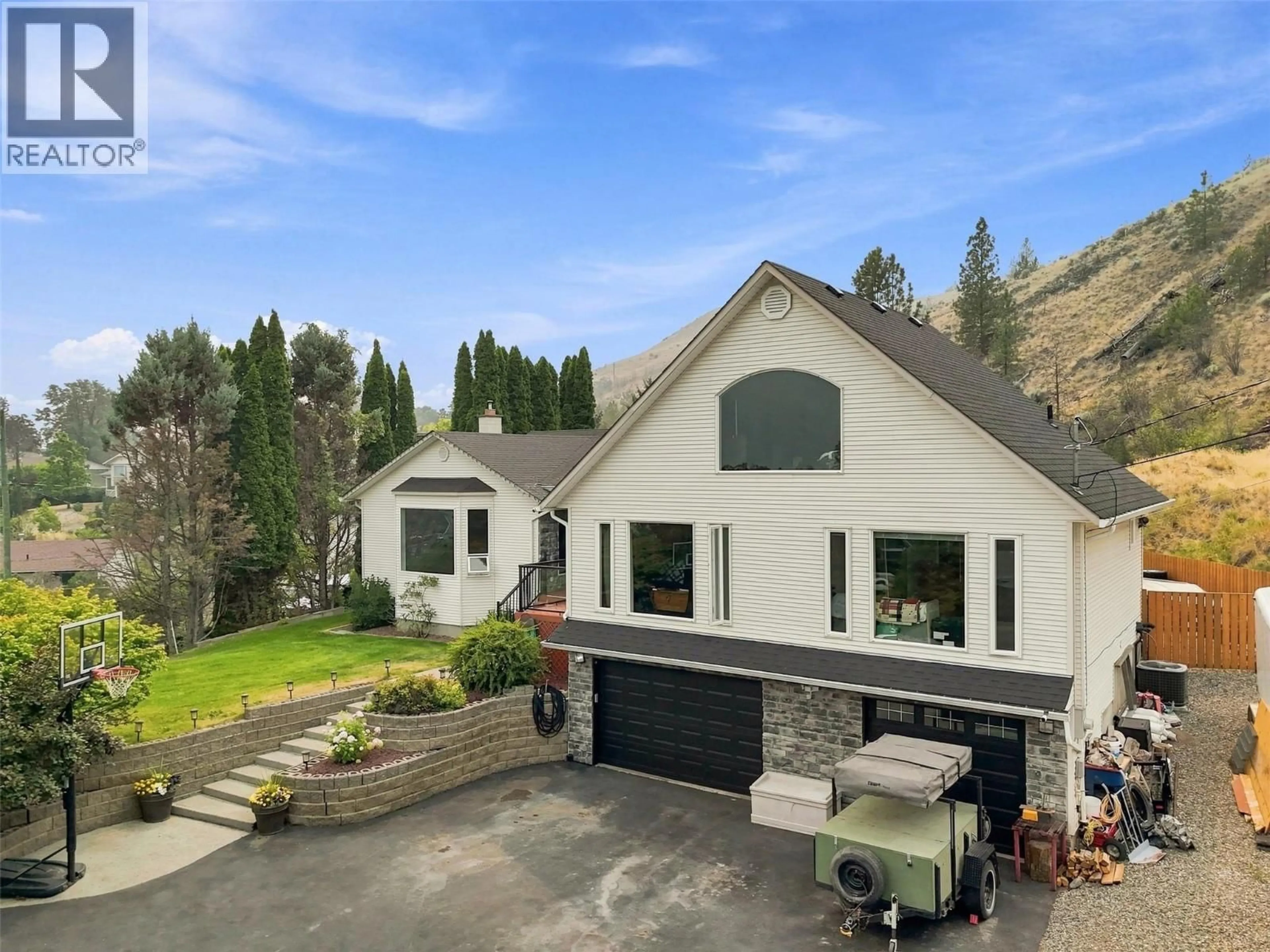A pic from outside/outdoor area/front of a property/back of a property/a pic from drone, mountain view for 897 WAWN ROAD, Kamloops British Columbia V2B6N3