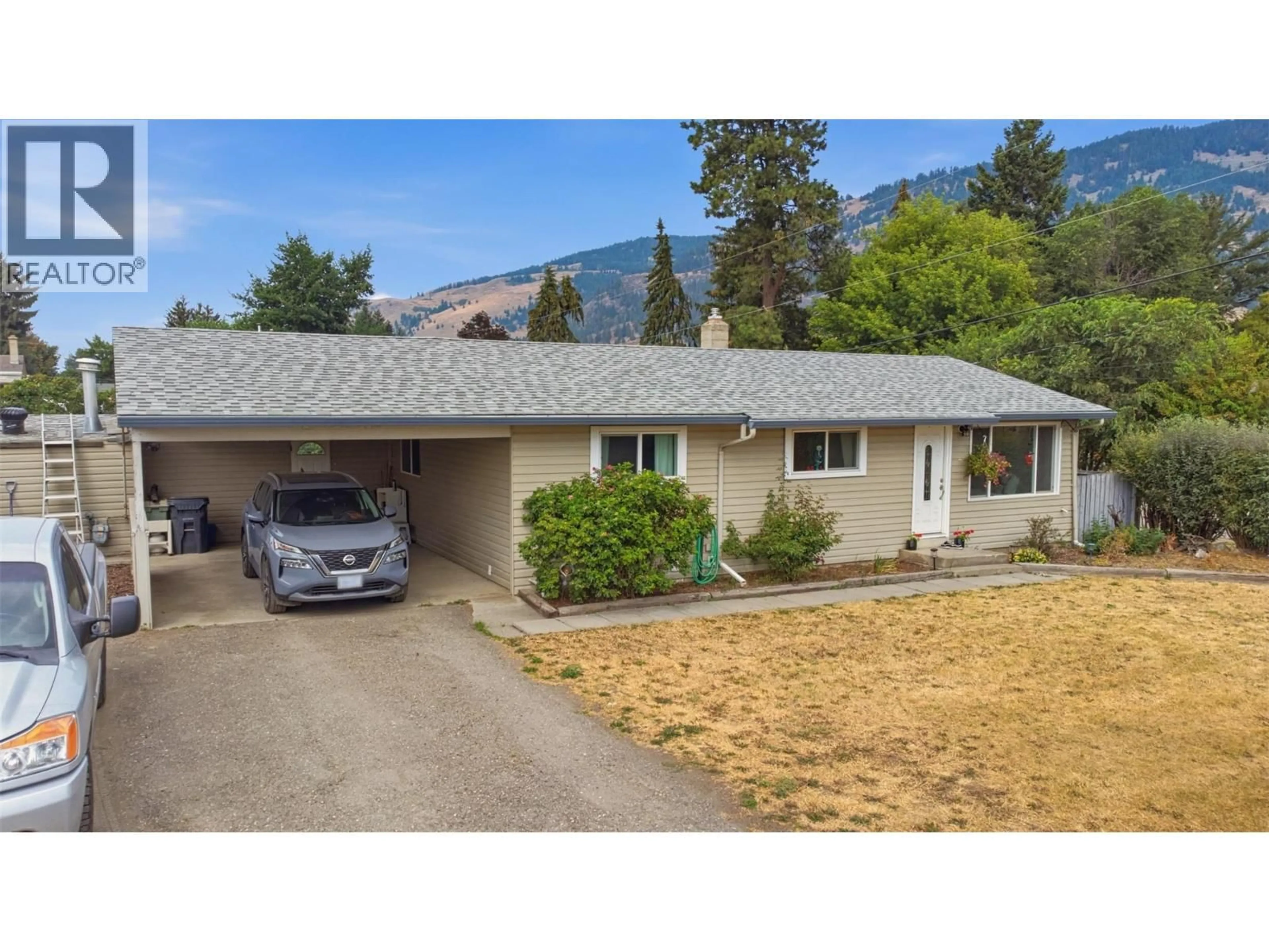 A pic from outside/outdoor area/front of a property/back of a property/a pic from drone, mountain view for 9694 SCHOOL ROAD, Coldstream British Columbia V1B3G4