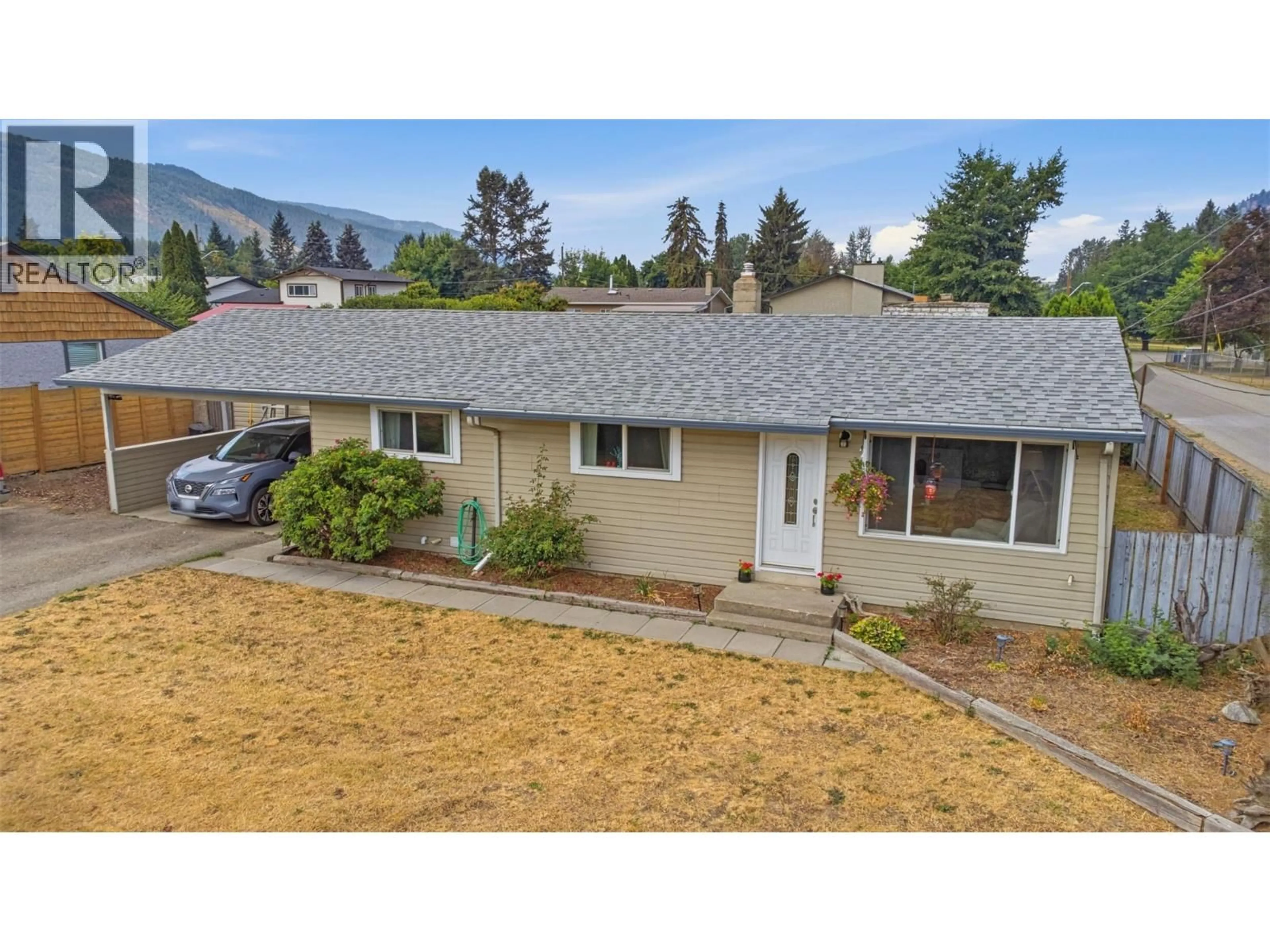 A pic from outside/outdoor area/front of a property/back of a property/a pic from drone, mountain view for 9694 SCHOOL ROAD, Coldstream British Columbia V1B3G4
