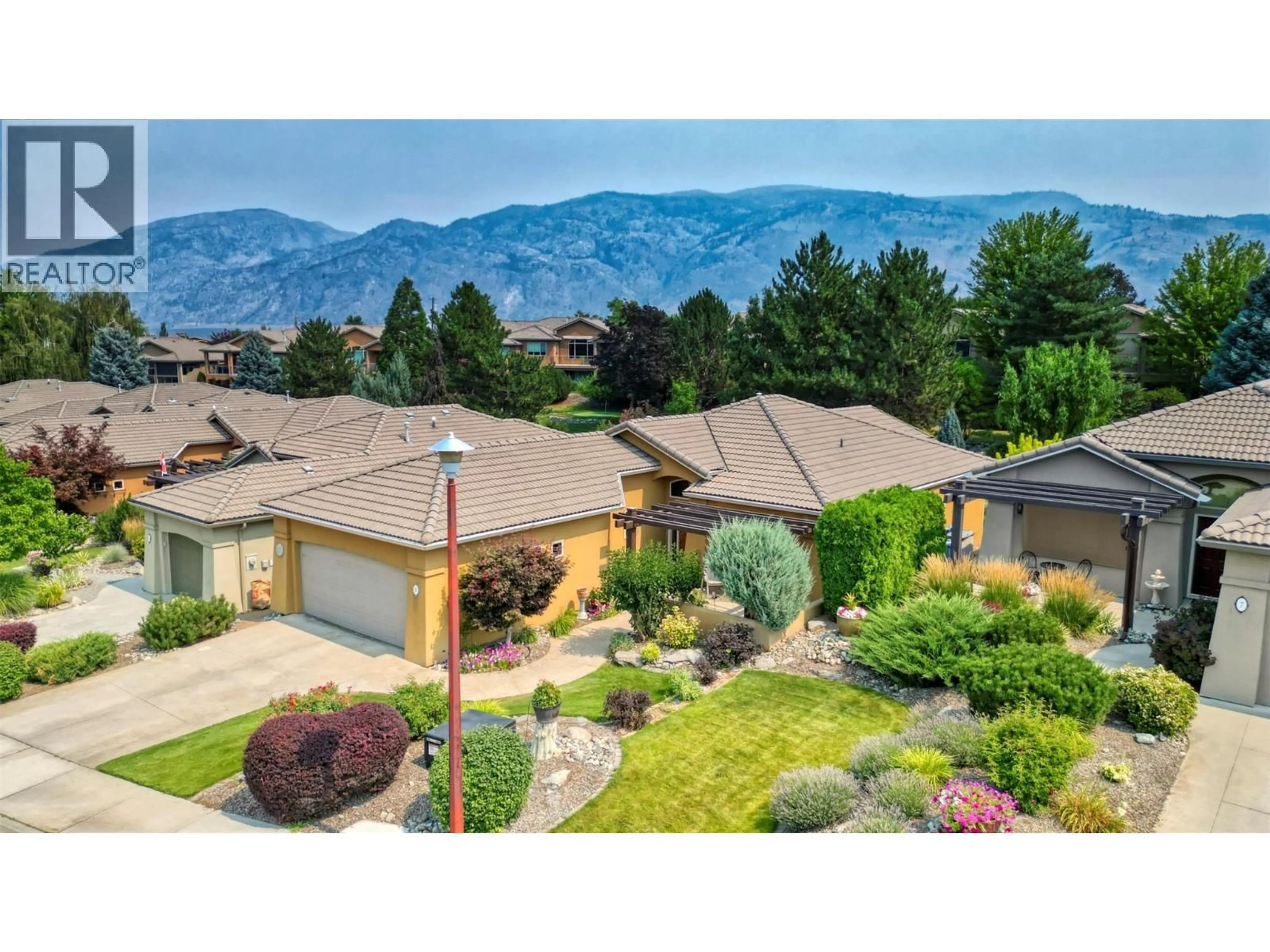 A pic from outside/outdoor area/front of a property/back of a property/a pic from drone, mountain view for 9 WILDFLOWER COURT, Osoyoos British Columbia V0H1V1