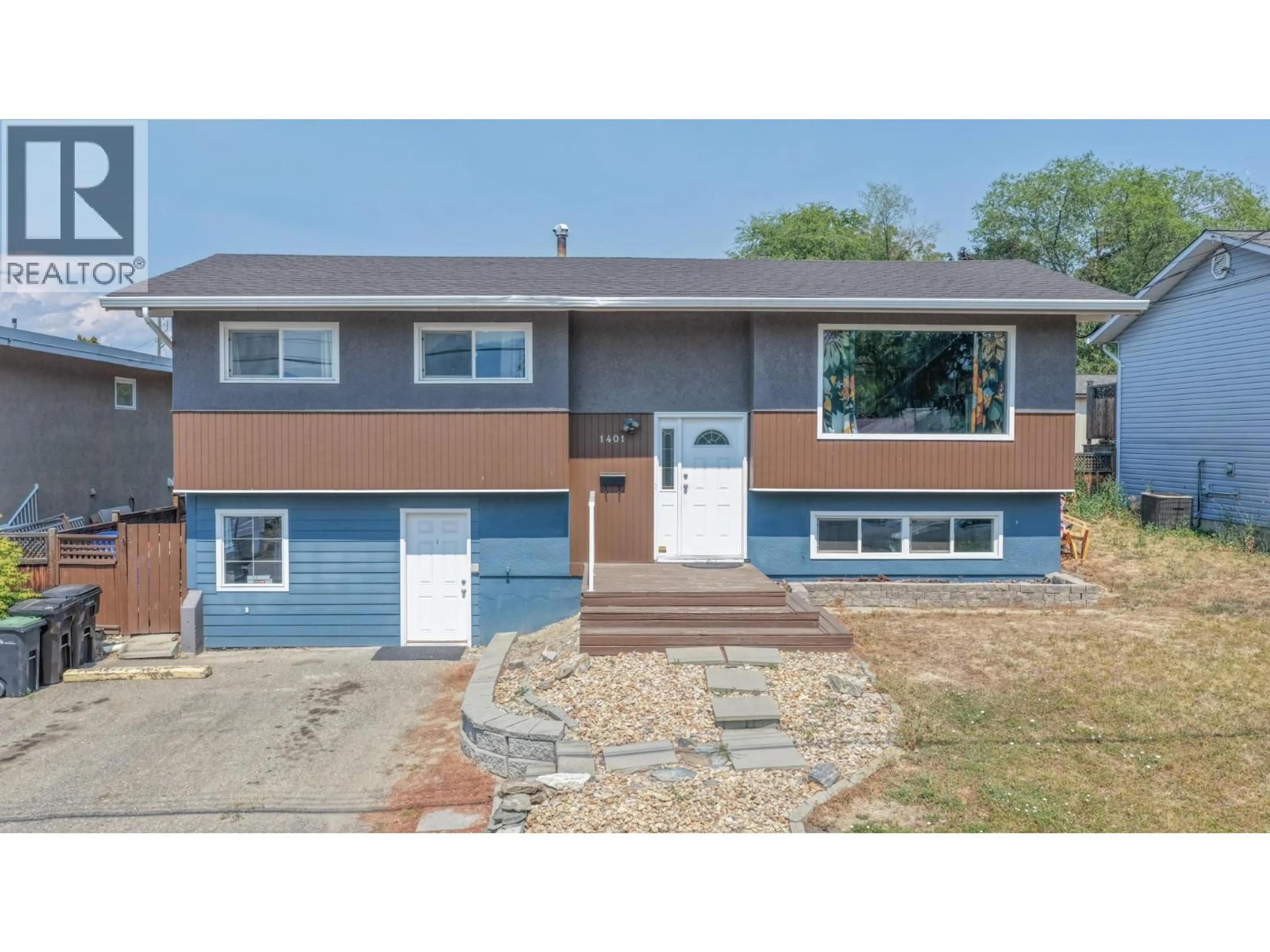 Home with vinyl exterior material, street for 1401 29 AVENUE, Vernon British Columbia V1T1Y4