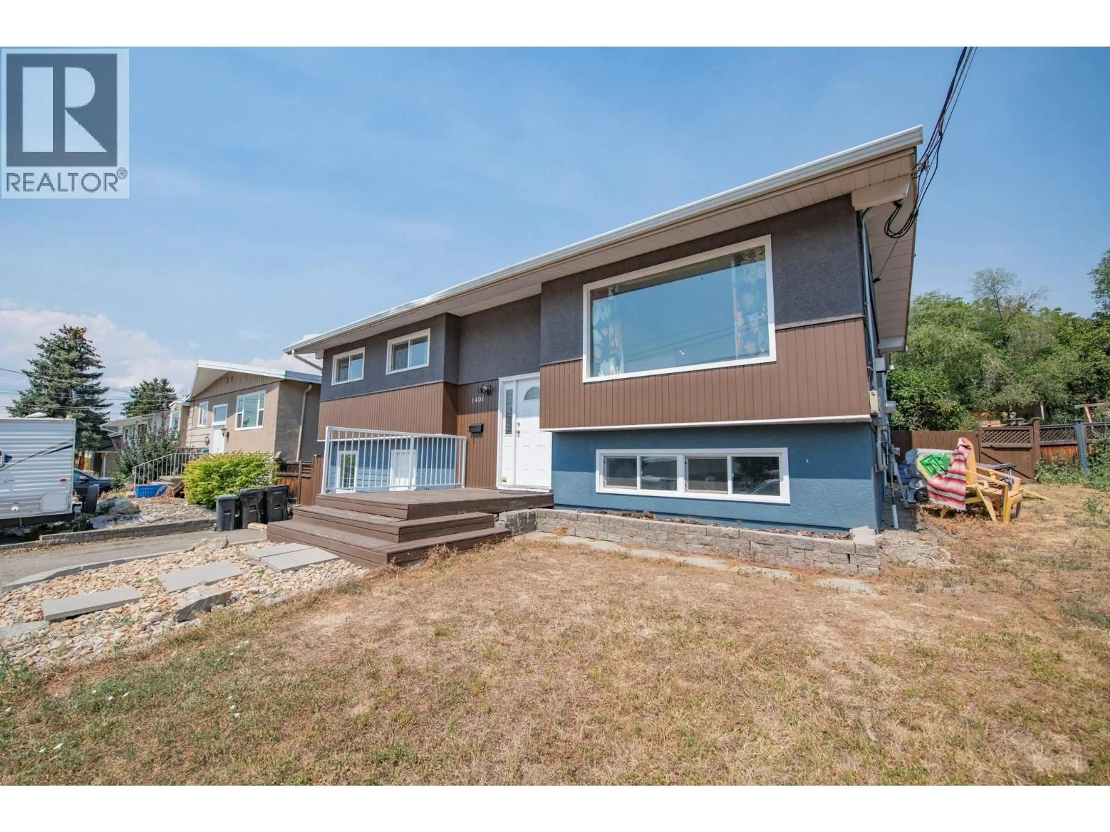 Home with vinyl exterior material, street for 1401 29 AVENUE, Vernon British Columbia V1T1Y4