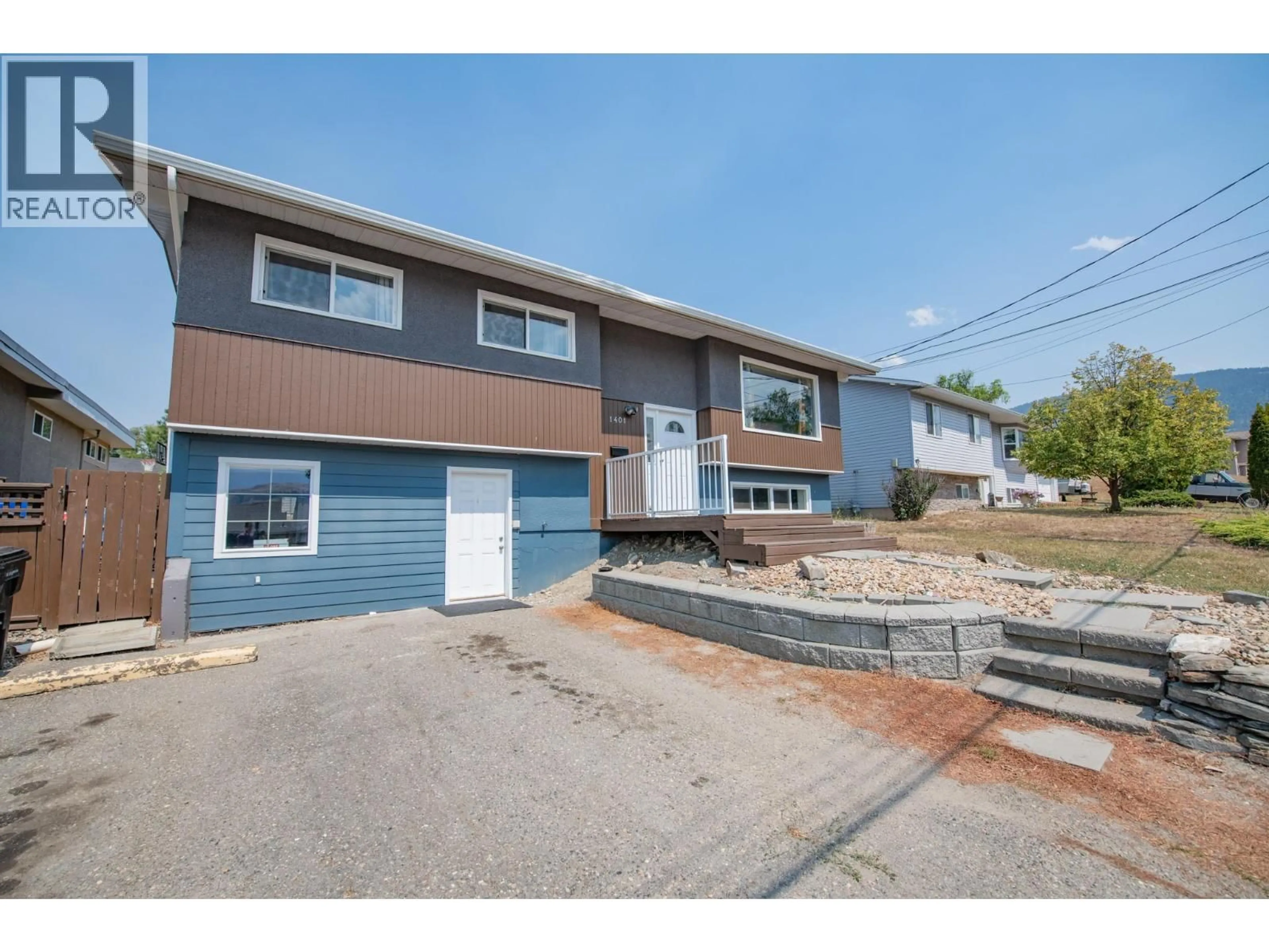 Home with vinyl exterior material, street for 1401 29 AVENUE, Vernon British Columbia V1T1Y4