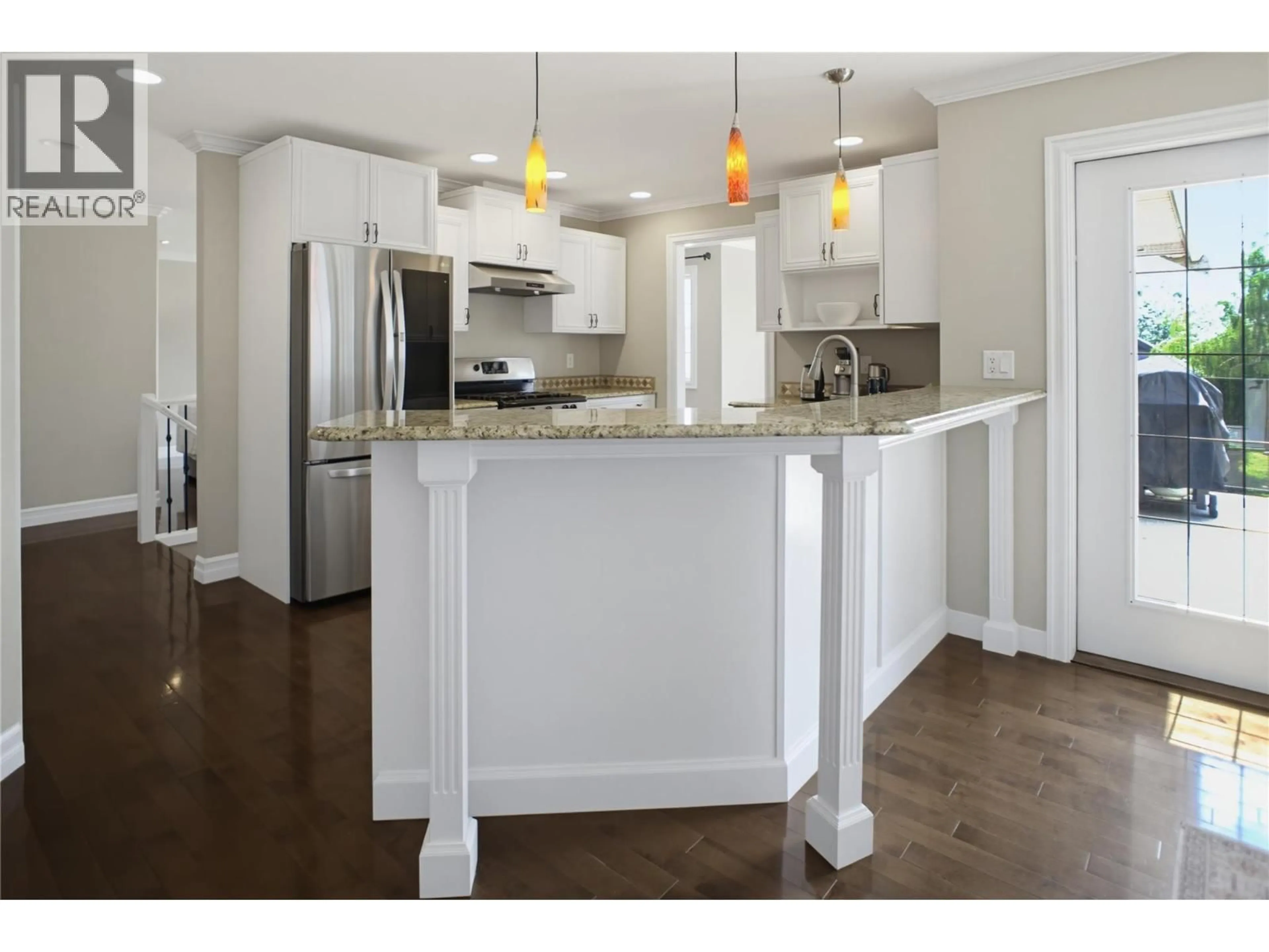 Open concept kitchen, wood/laminate floor for 1289 COPPERHEAD DRIVE, Kamloops British Columbia V2E0A1