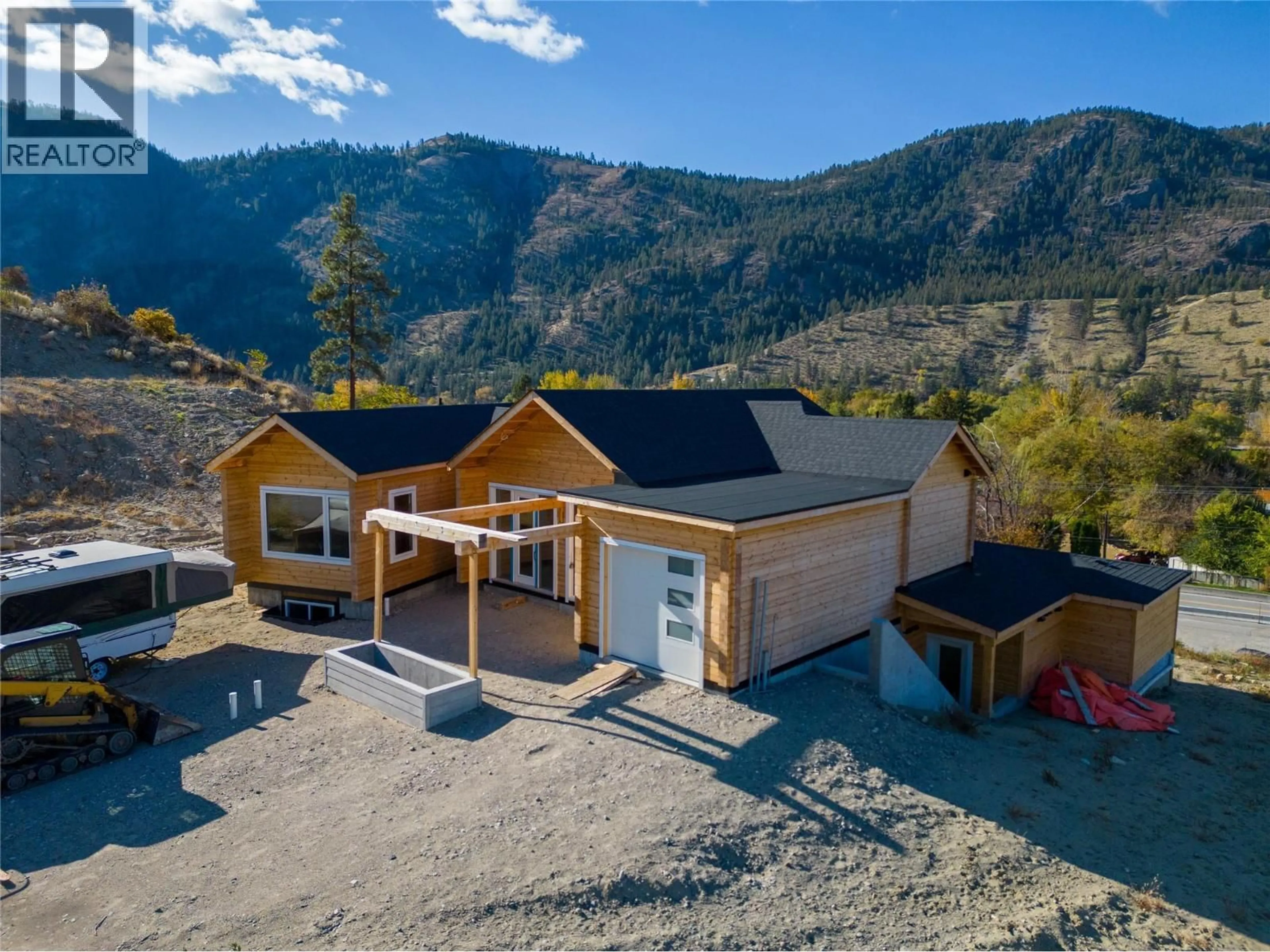 A pic from outside/outdoor area/front of a property/back of a property/a pic from drone, mountain view for 4850 BASSETT AVENUE, Okanagan Falls British Columbia V0H1R2