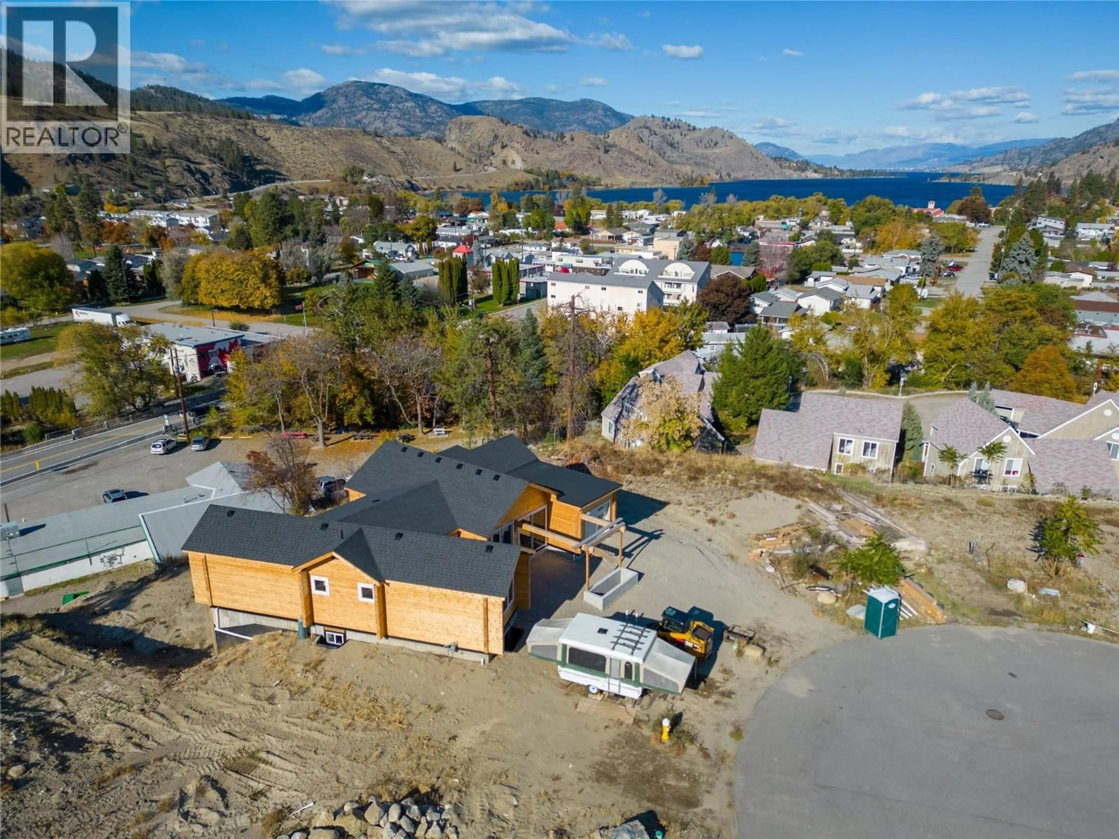 A pic from outside/outdoor area/front of a property/back of a property/a pic from drone, water/lake/river/ocean view for 4850 BASSETT AVENUE, Okanagan Falls British Columbia V0H1R2