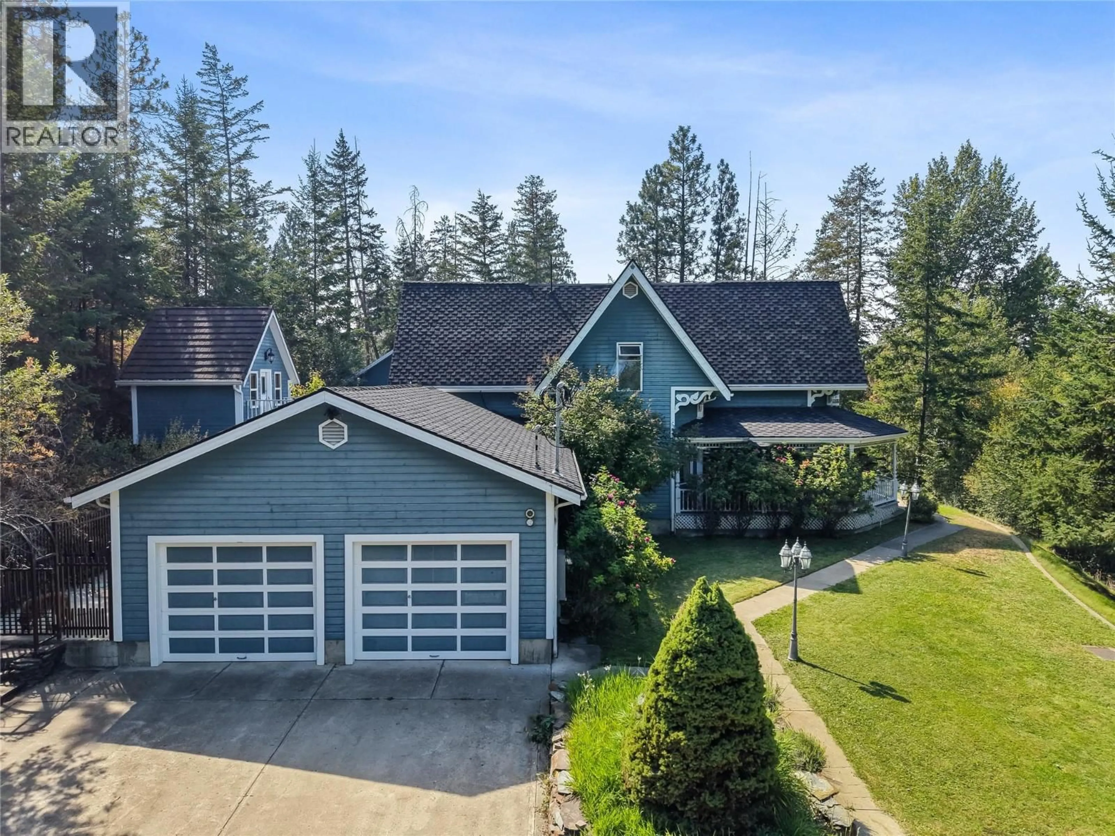 A pic from outside/outdoor area/front of a property/back of a property/a pic from drone, unknown for 4345 JUNE SPRINGS ROAD, Kelowna British Columbia V1W4C8