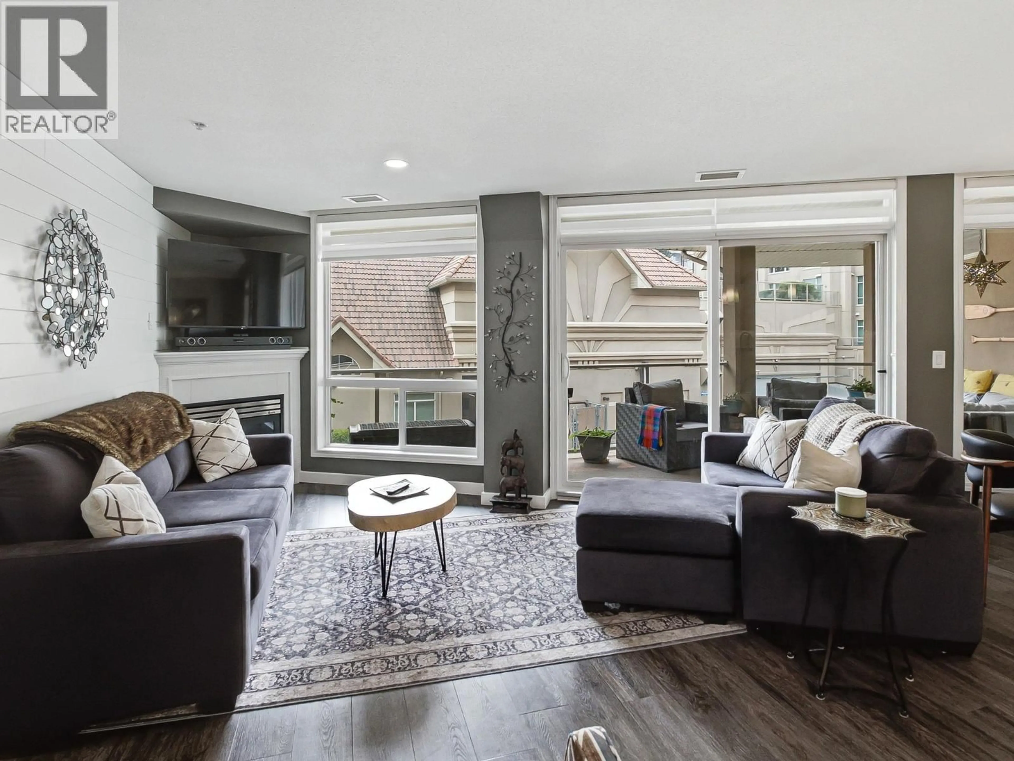 Living room with furniture, unknown for 242 - 1088 SUNSET DRIVE, Kelowna British Columbia V1Y9W1