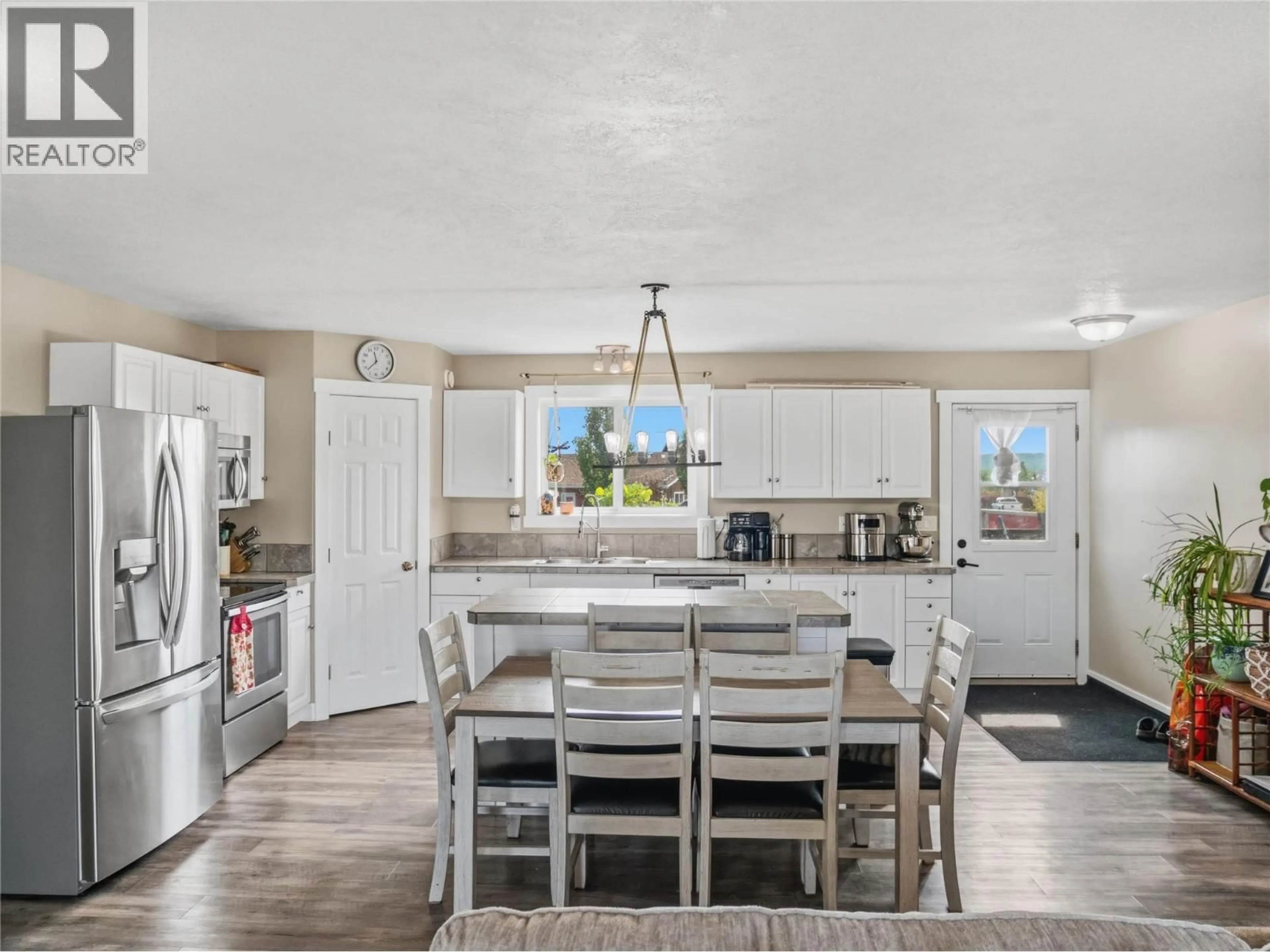 Open concept kitchen, ceramic/tile floor for 4609 RAILWAY AVENUE, Pouce Coupe British Columbia V0C2C0